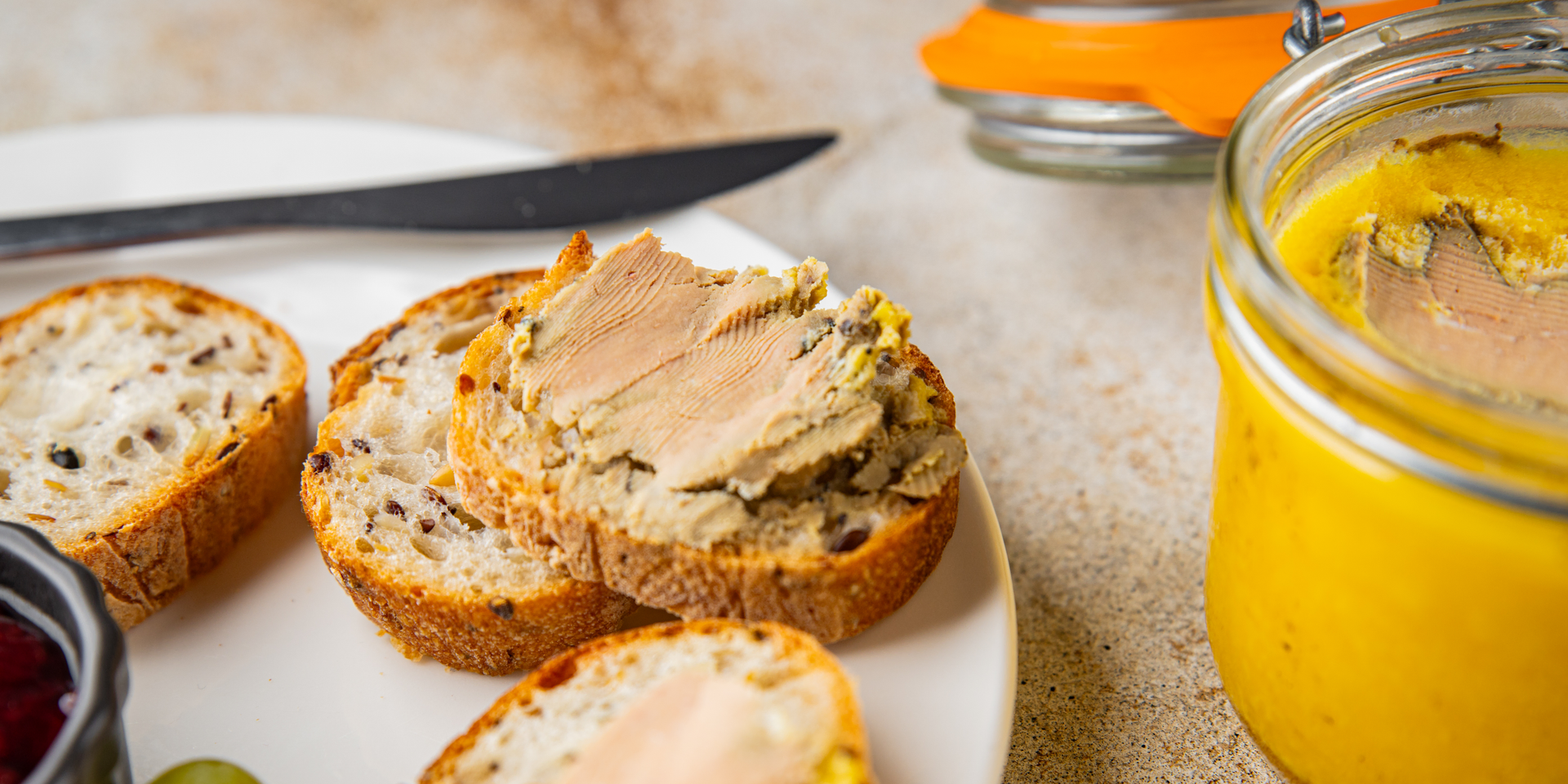 Overhead flat-lay of all ingredients for Portuguese Sardine Pâté with Lemon Zest laid out on a kitchen surface.