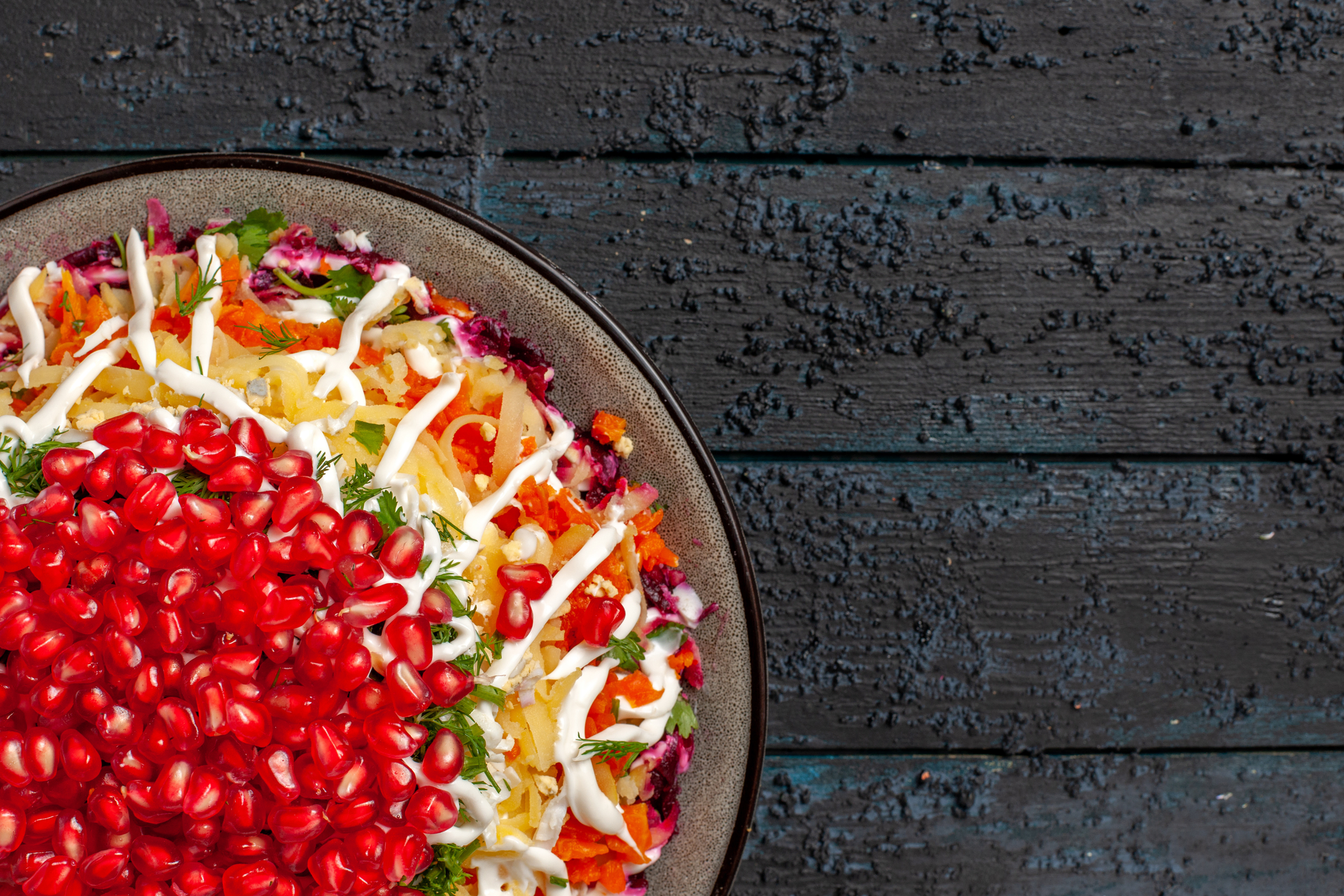 Overhead flat-lay of all ingredients for Refreshing Italian Fennel and Orange Salad with Pomegranate Seeds laid out on a kitchen surface.