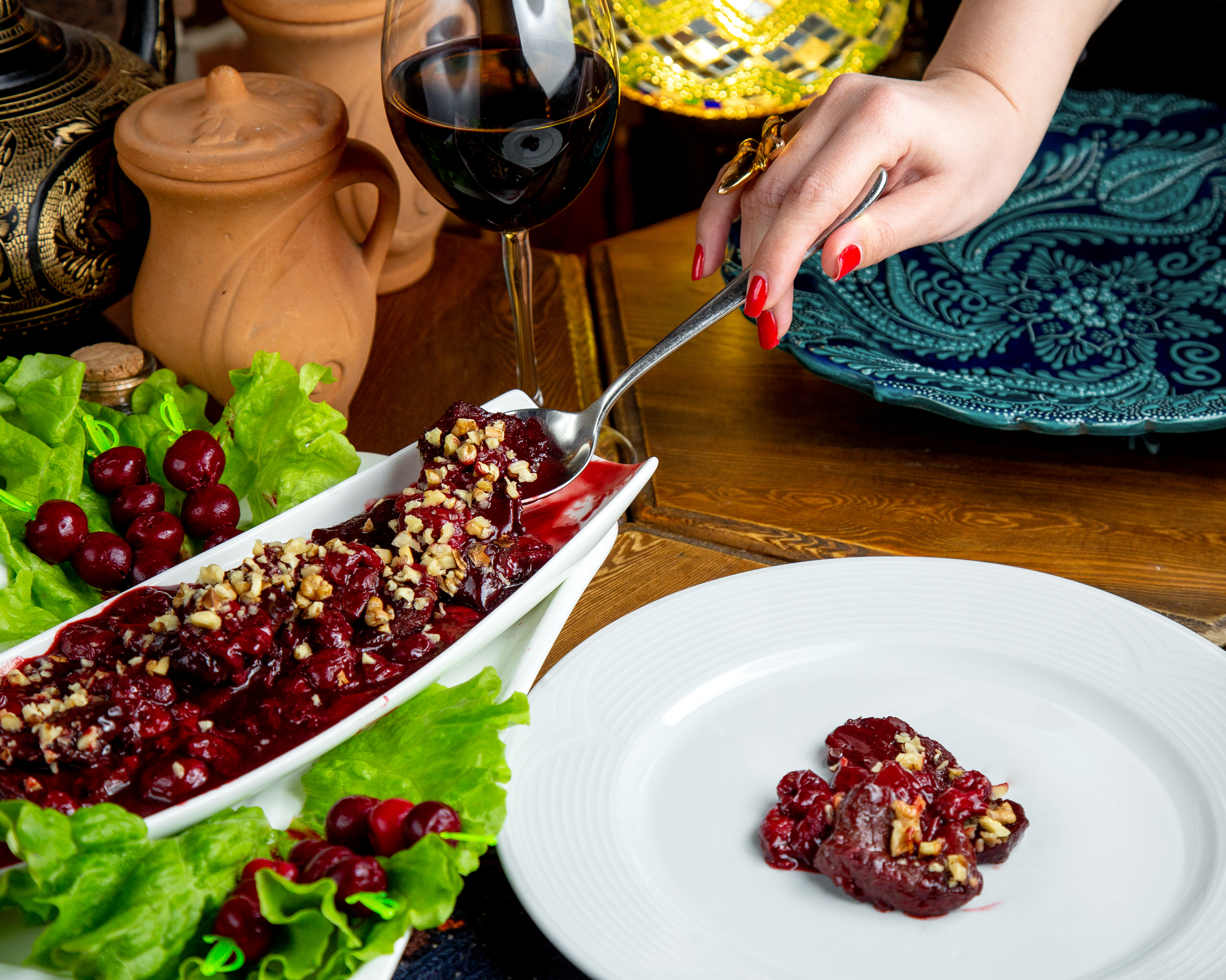 Overhead flat-lay of all ingredients for Refreshing Persian Date Shirazi Salad with Pomegranate Arils laid out on a kitchen surface.