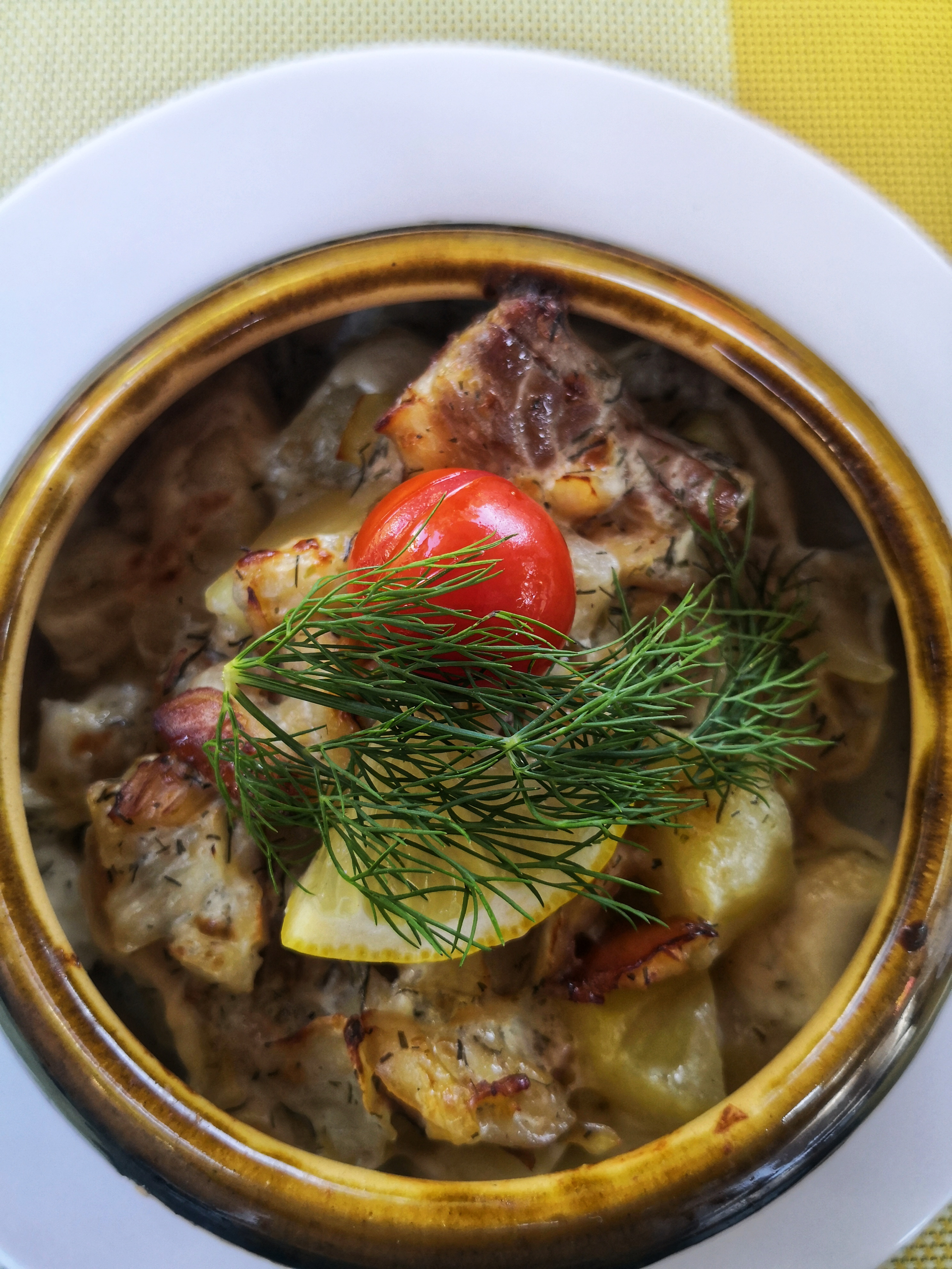 Overhead flat-lay of all ingredients for Rich Croatian Peka with Lamb and Vegetables laid out on a kitchen surface.