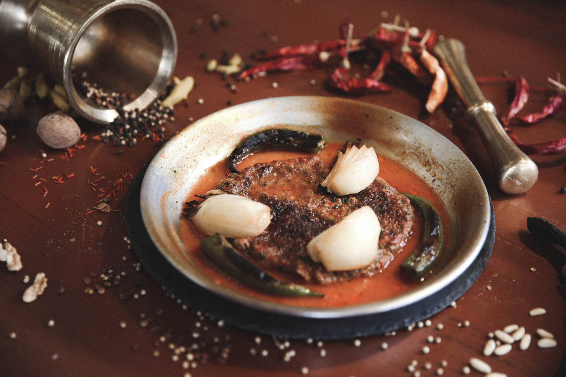 Overhead flat-lay of all ingredients for Rich Filipino Dinuguan with Blood and Vinegar Sauce laid out on a kitchen surface.