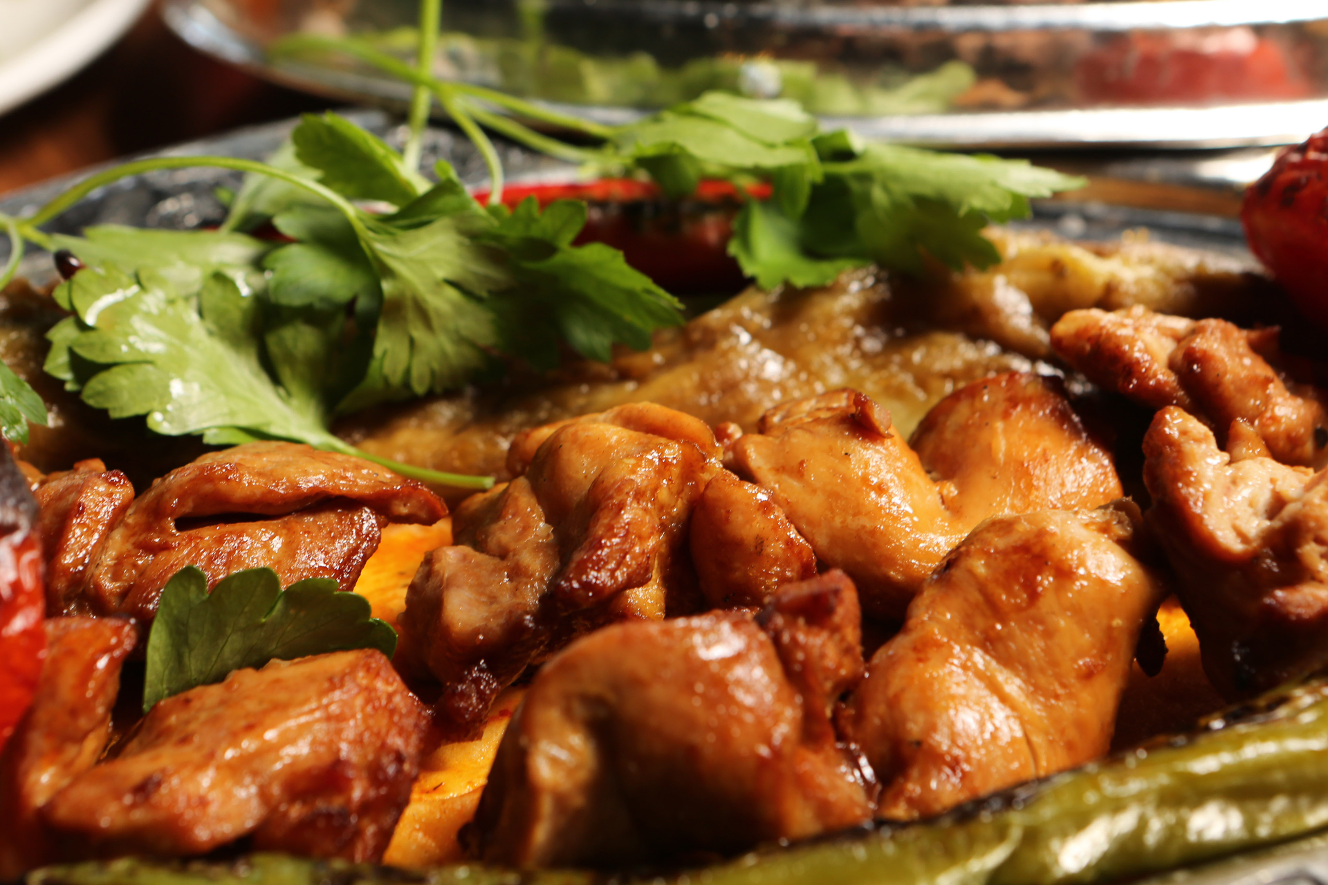 Overhead flat-lay of all ingredients for Rich Gambian Yassa Chicken with Lime and Onion Marination laid out on a kitchen surface.