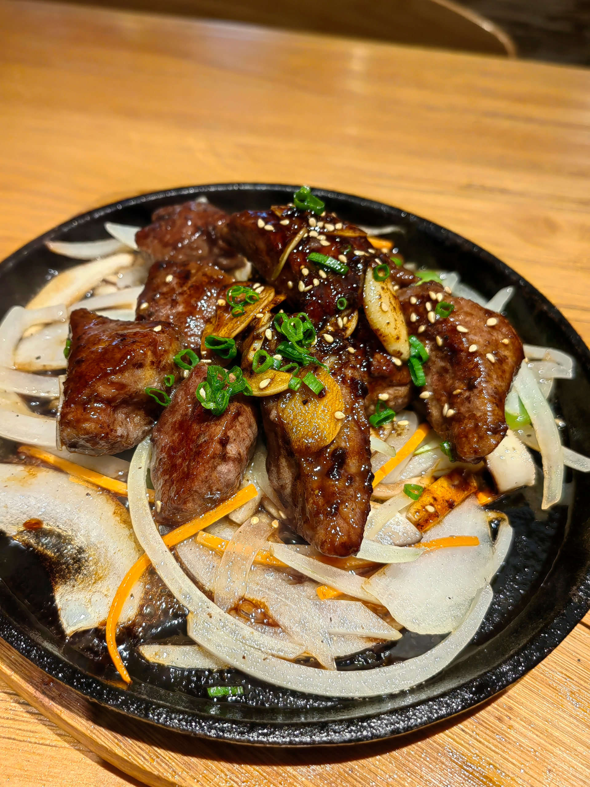 Overhead flat-lay of all ingredients for Rich Korean Seolleongtang with Tender Beef Shanks and Radish laid out on a kitchen surface.