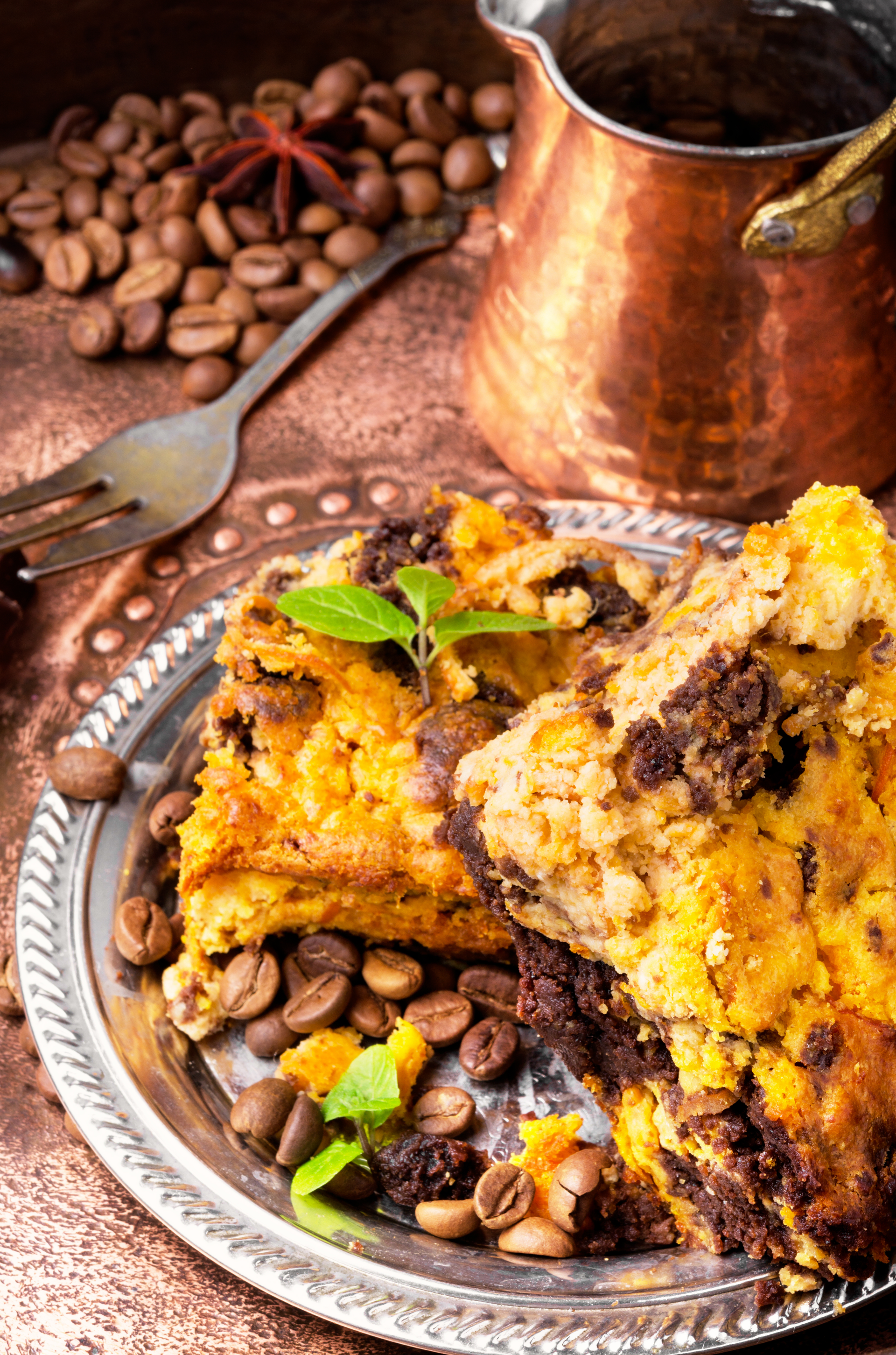 Overhead flat-lay of all ingredients for Rich Moroccan Chicken Bastilla with Almond and Cinnamon laid out on a kitchen surface.