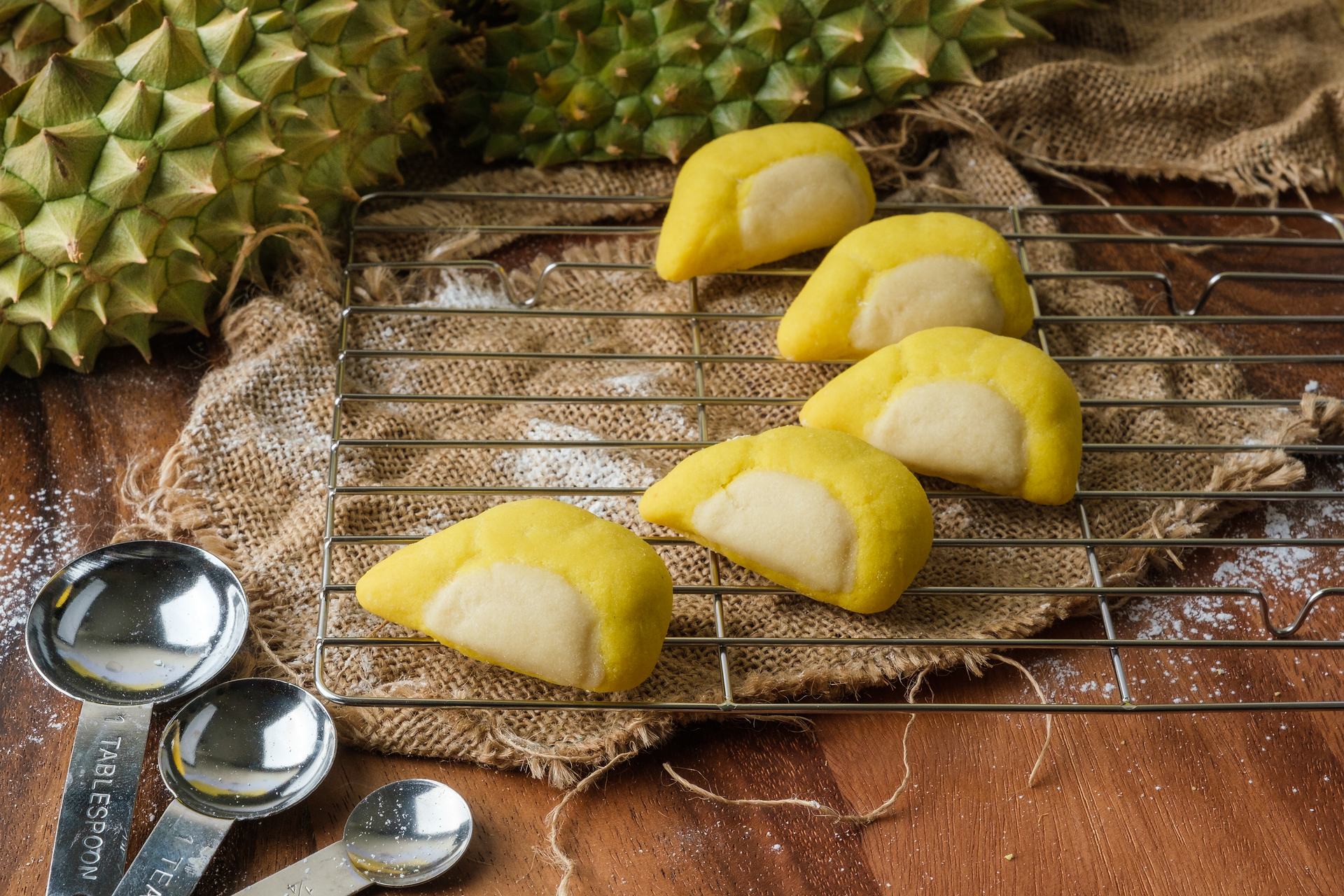 Overhead flat-lay of all ingredients for Rich Taiwanese Pineapple Cake with Golden Crust laid out on a kitchen surface.