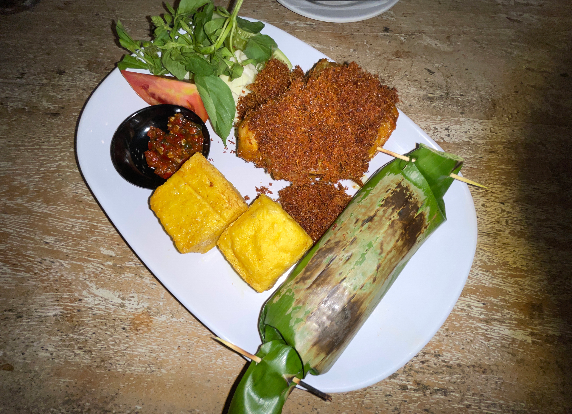 Rich Venezuelan Hallacas with Plantain Leaves — Main Course served and photographed from above