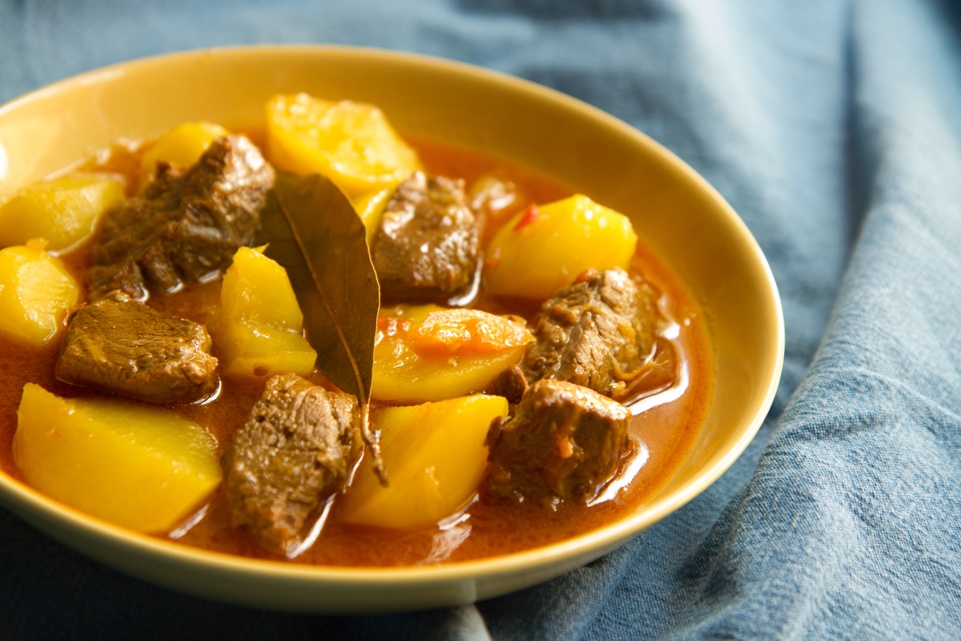 Roasted Jamaican Plantain and Coconut Beef Stew — Main Course served and photographed from above