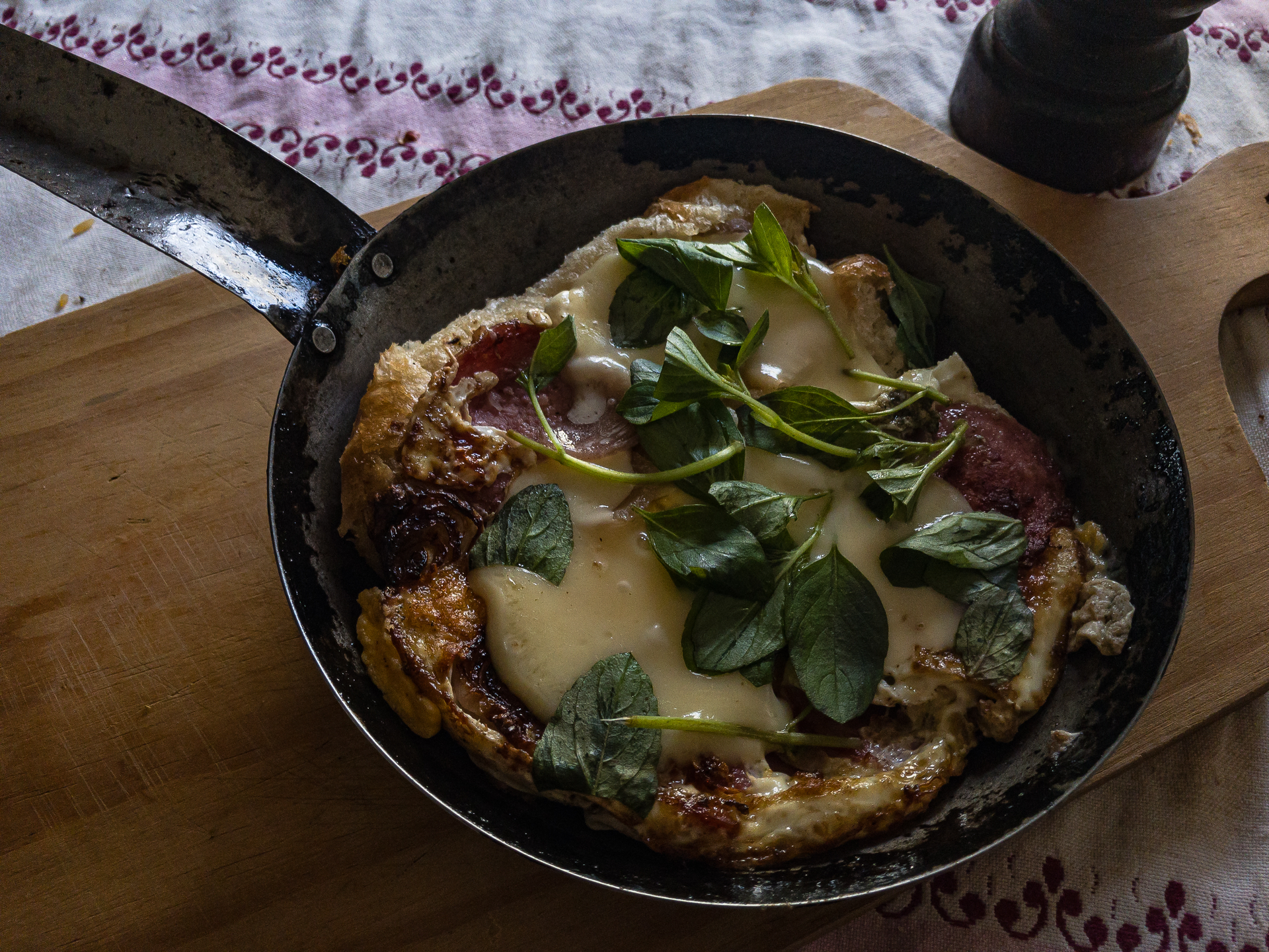 Rustic Argentinian Provoleta with Herbs and Garlic — Appetizer served and photographed from above