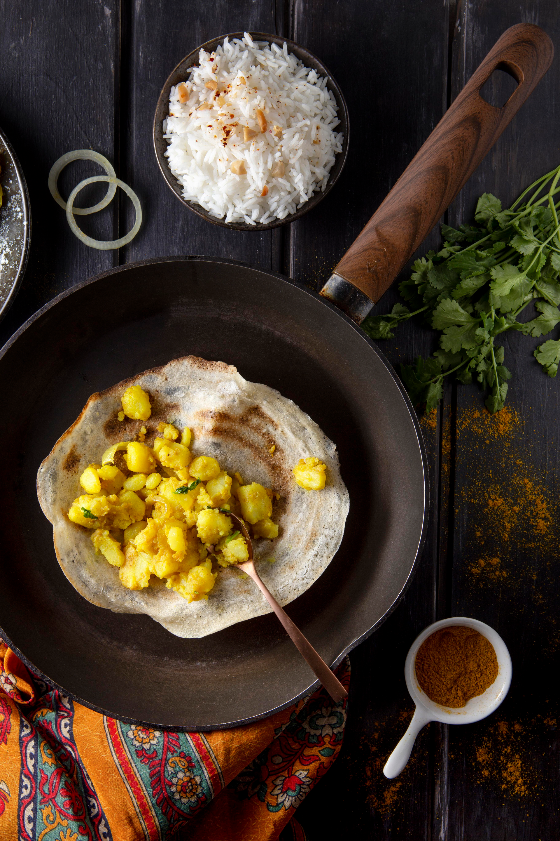 Rustic Ethiopian Teff Pancakes with Ginger Stewed Lentils — Breakfast served and photographed from above