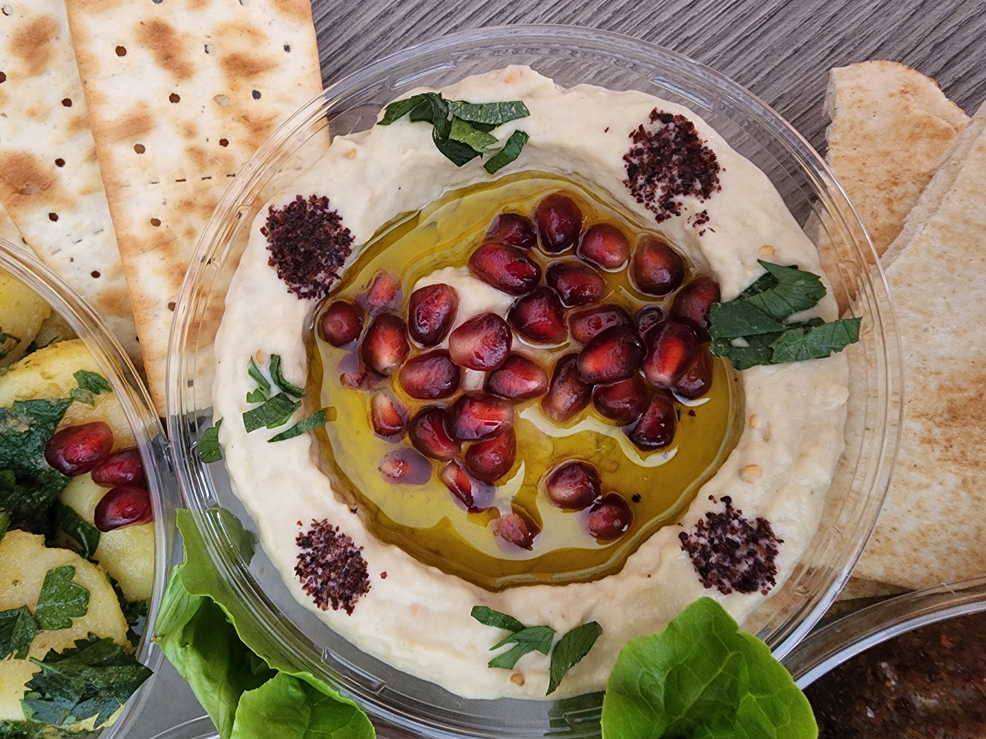 Rustic Georgian Spinach Pkhali with Walnuts and Pomegranate Seeds — Appetizer served and photographed from above