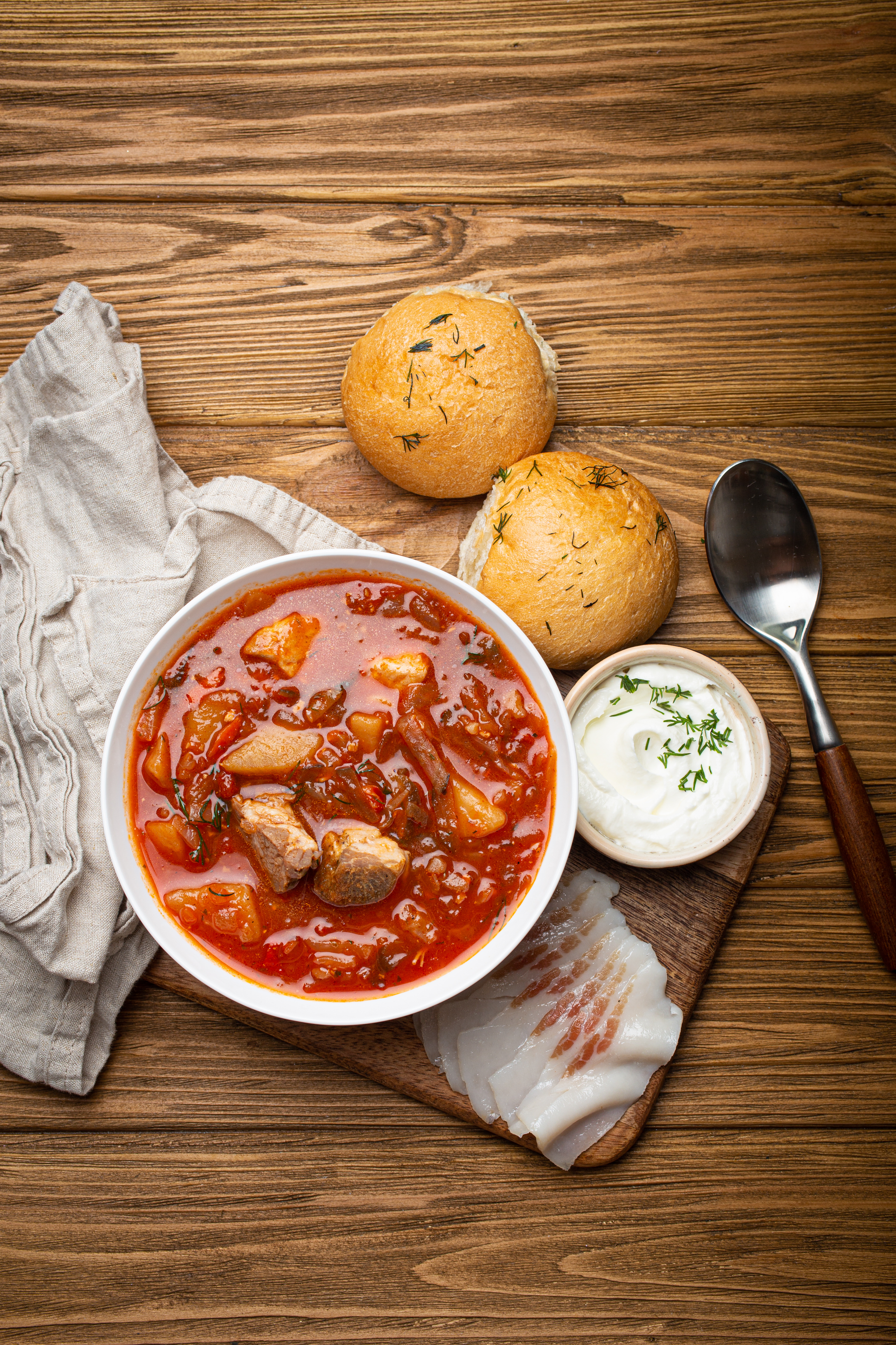 Rustic Hungarian Pörkölt with Paprika and Dumplings — Main Course served and photographed from above