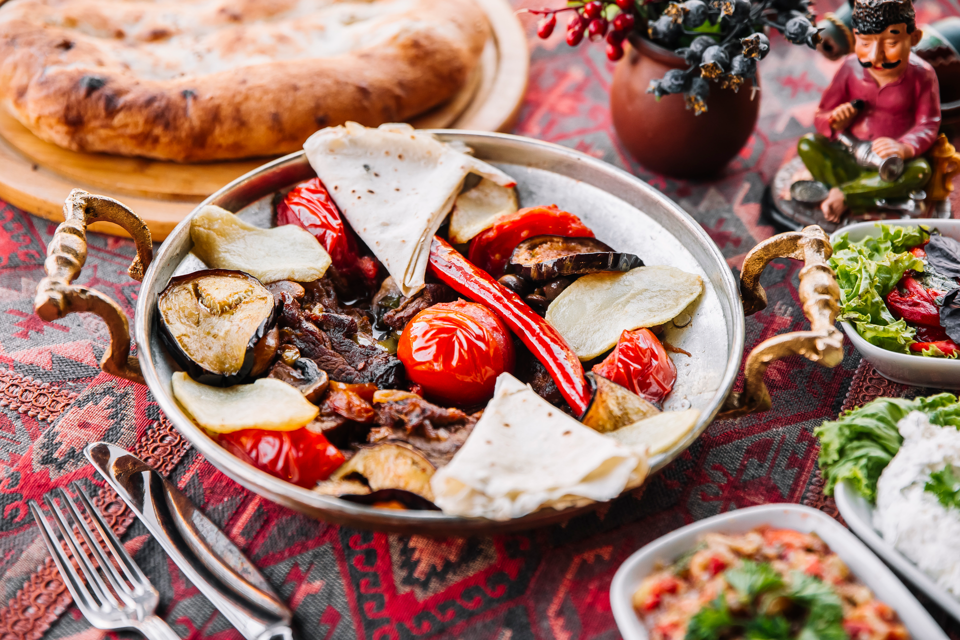 Overhead flat-lay of all ingredients for Rustic Lithuanian Skilandis with Black Pepper and Garlic laid out on a kitchen surface.