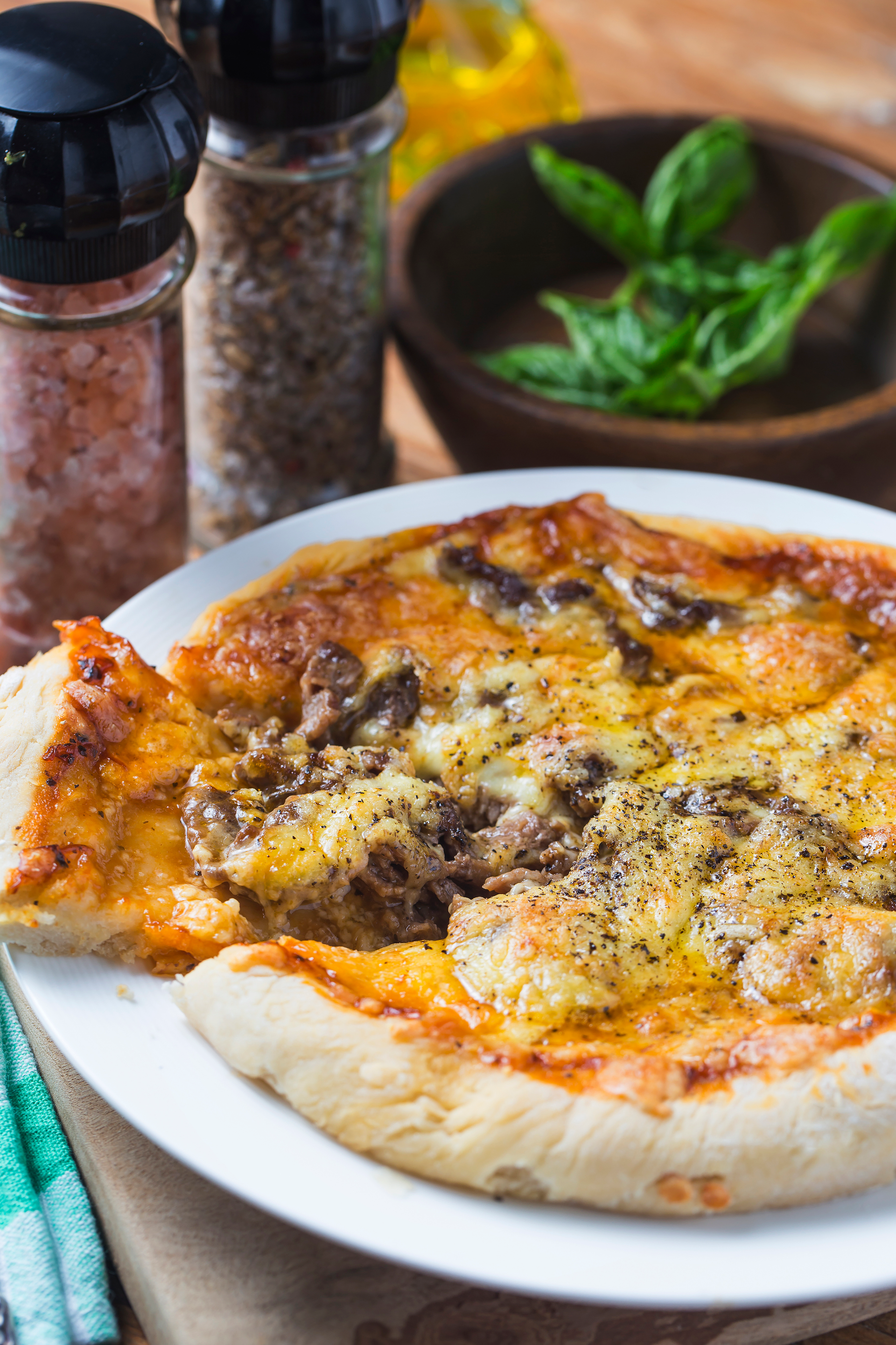 Overhead flat-lay of all ingredients for Rustic Sicilian Sfincione with Anchovies and Pecorino laid out on a kitchen surface.
