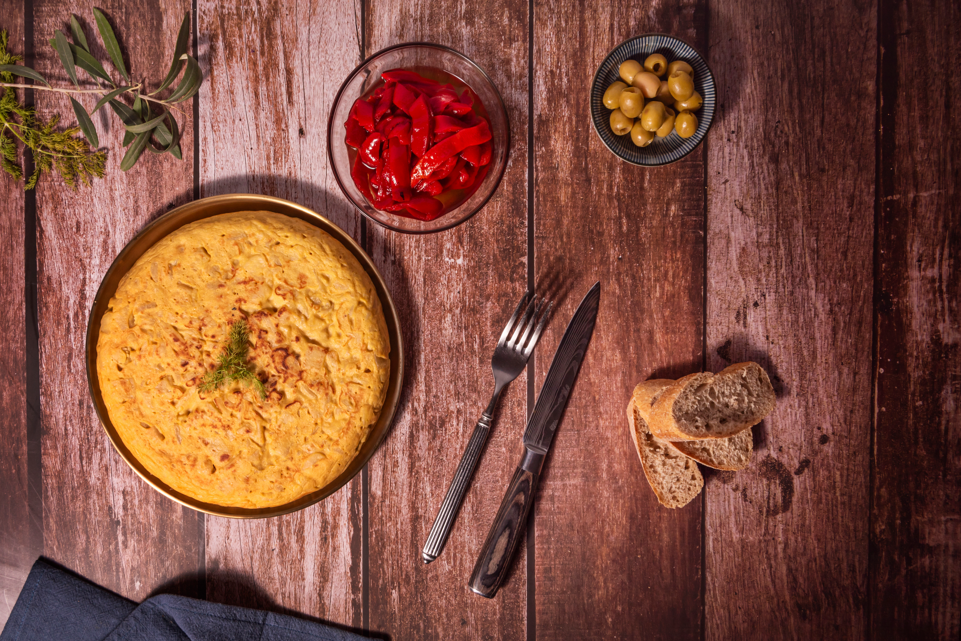 Overhead flat-lay of all ingredients for Saffron-Infused Egyptian Red Lentil and Garbanzo Tahini Dip laid out on a kitchen surface.