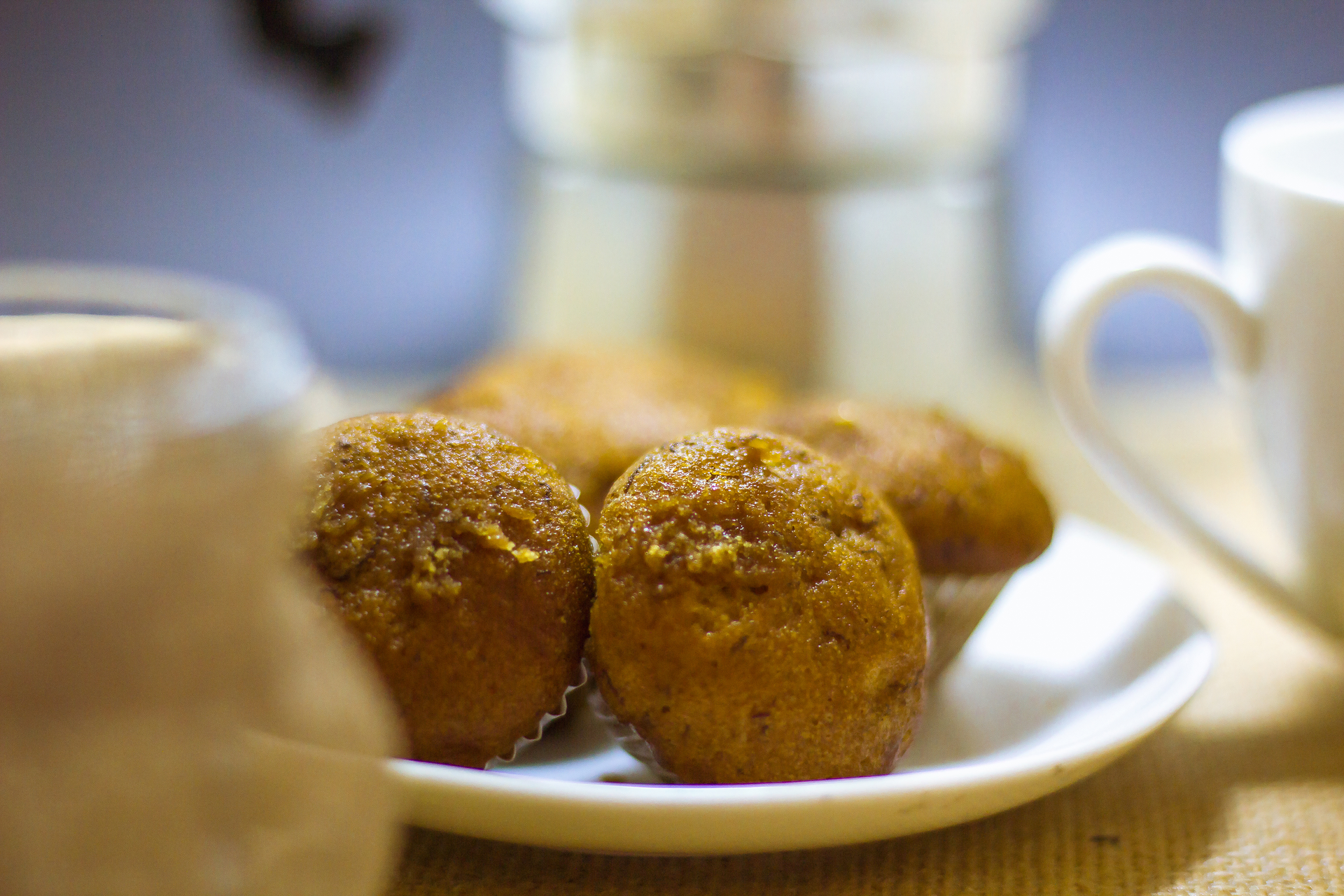 Overhead flat-lay of all ingredients for Saffron-Infused Sicilian Arancini with Parmesan and Peas laid out on a kitchen surface.