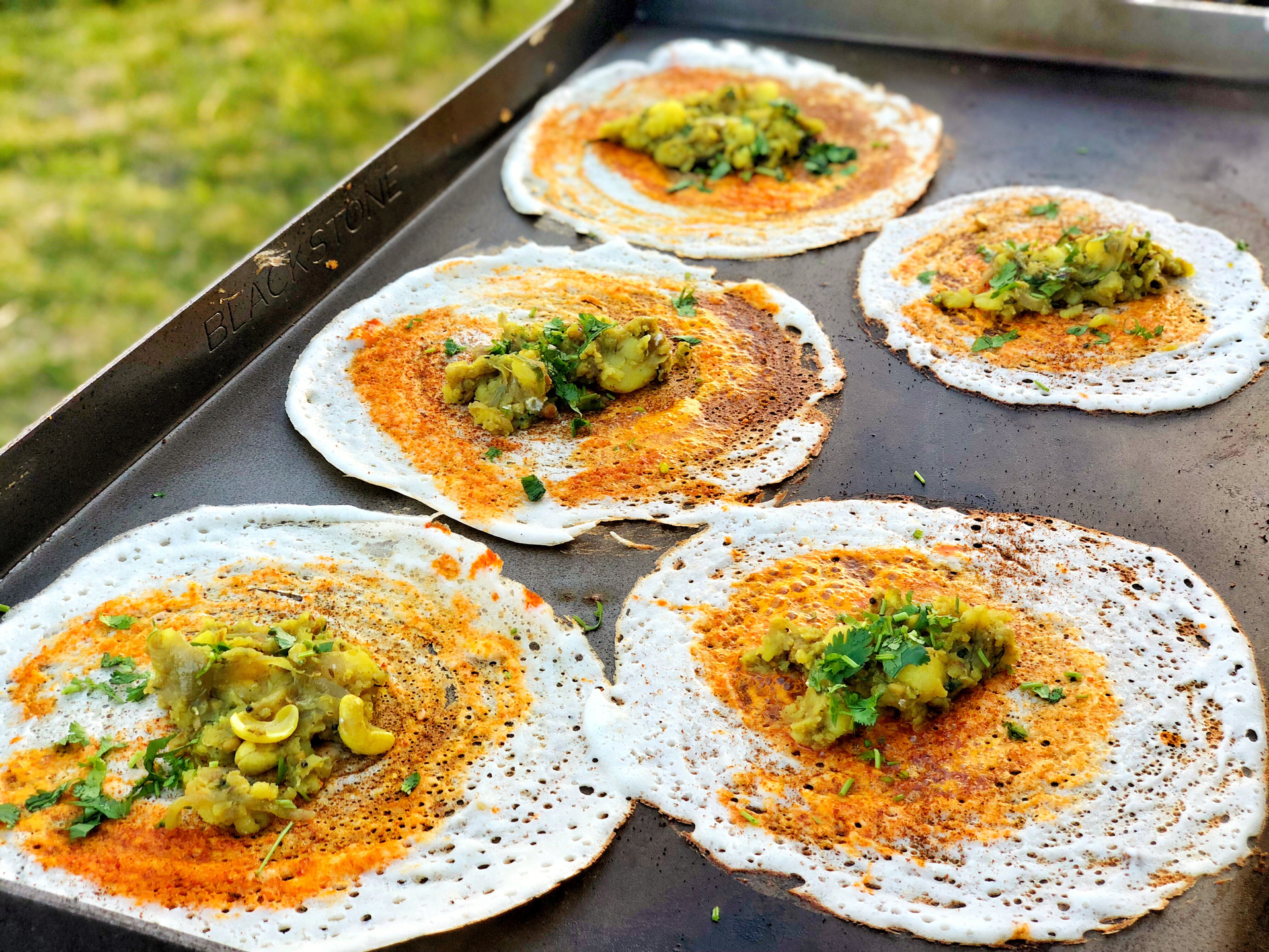 Overhead flat-lay of all ingredients for Saffron-Scented Afghan Bolani with Lentil Filling laid out on a kitchen surface.