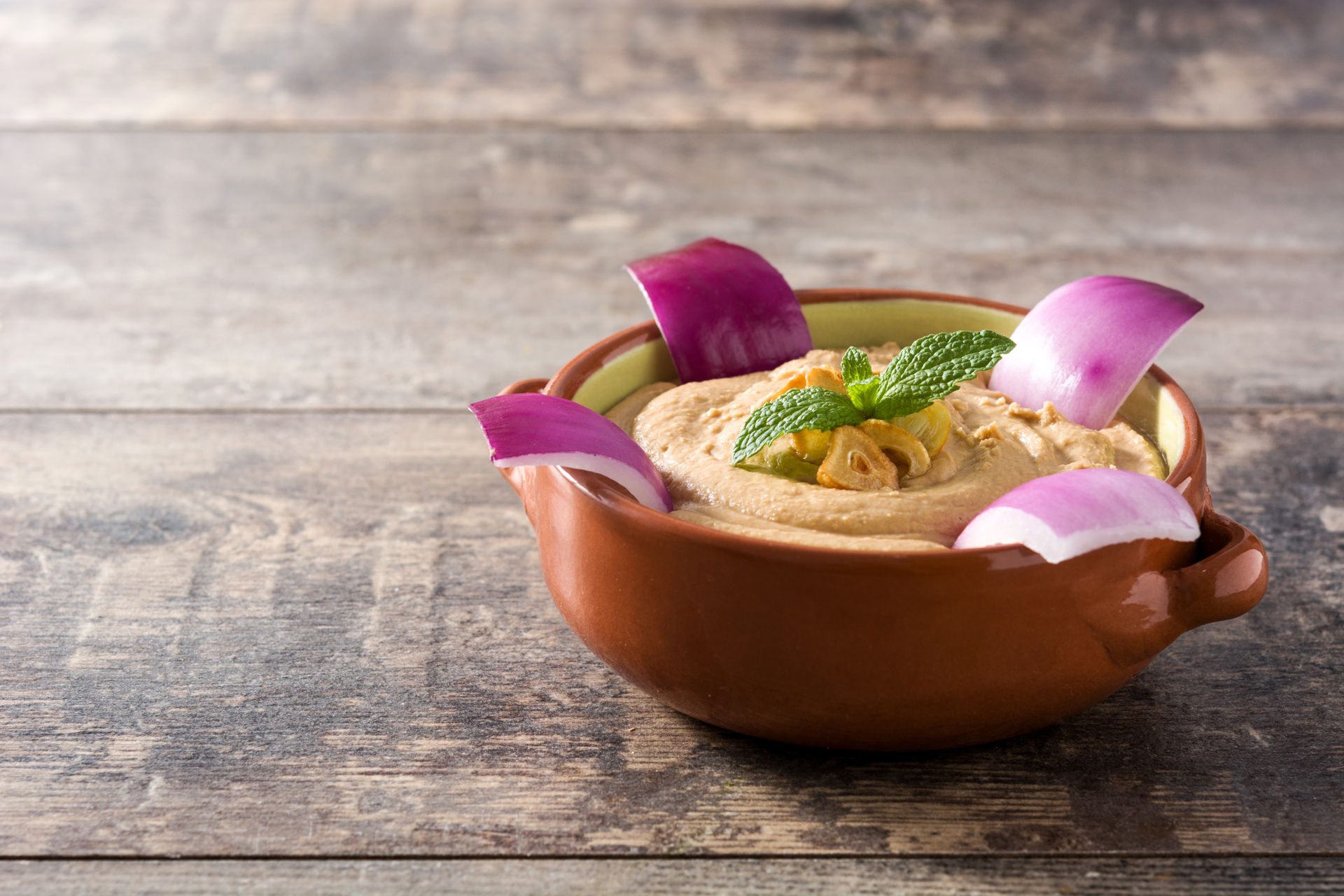 Overhead flat-lay of all ingredients for Savory Brazilian Vatapá with Cashew Nuts and Coconut Milk laid out on a kitchen surface.