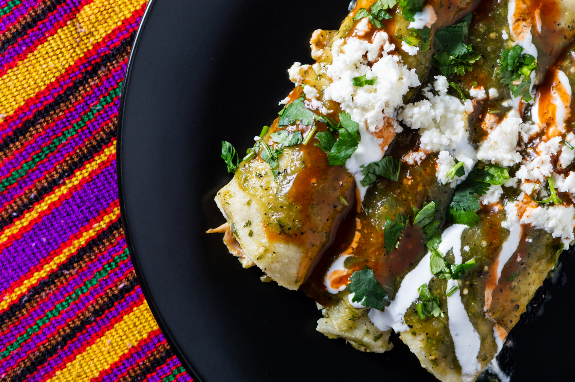 Overhead flat-lay of all ingredients for Savory Ethiopian Misir Wat Enchiladas laid out on a kitchen surface.