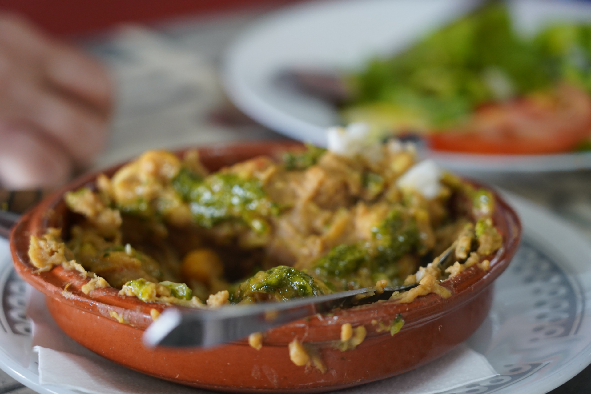 Overhead flat-lay of all ingredients for Savory Guatemalan Jocón de Pollo with Cilantro Sauce laid out on a kitchen surface.