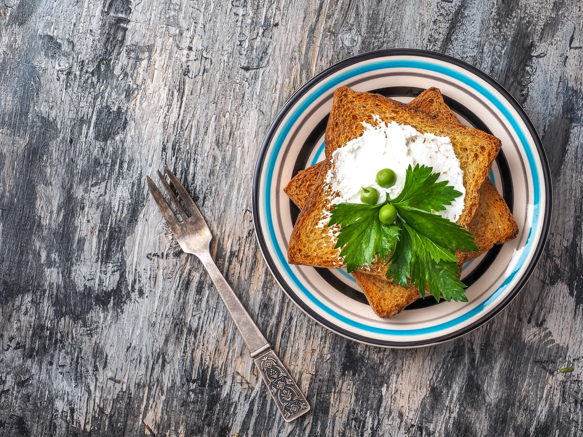 Overhead flat-lay of all ingredients for Savory Icelandic Plokkfiskur with Rye Bread laid out on a kitchen surface.