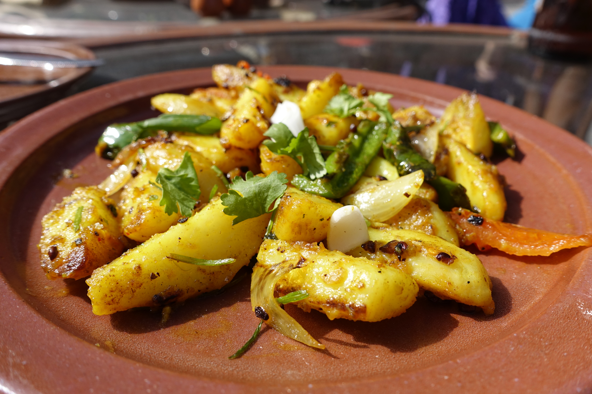 Overhead flat-lay of all ingredients for Savory Peruvian Ocopa with Boiled Potatoes and Aji Amarillo laid out on a kitchen surface.