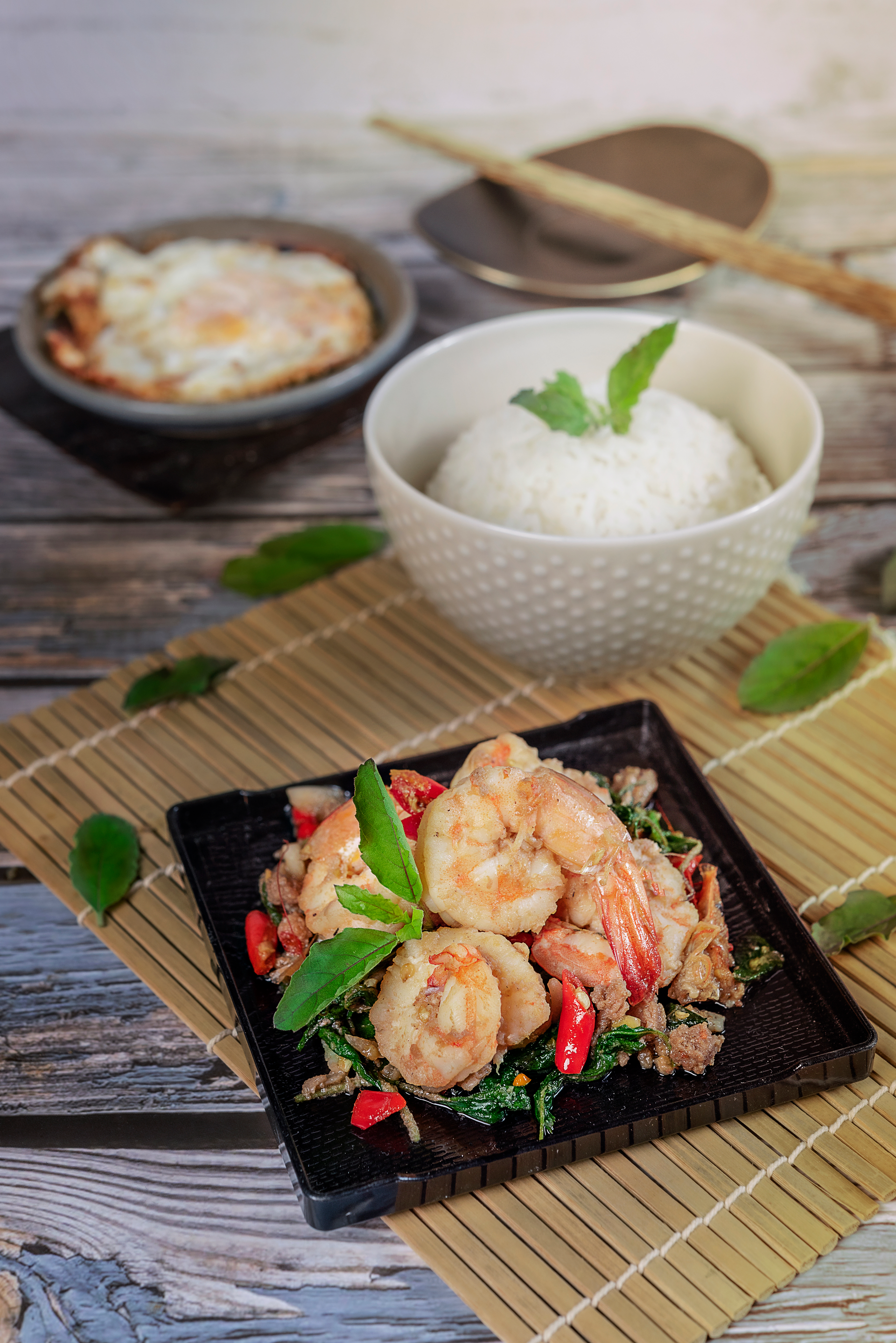 Overhead flat-lay of all ingredients for Savory Thai Miang Kham laid out on a kitchen surface.