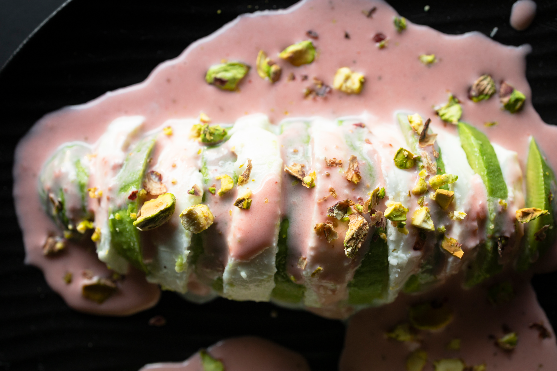 Overhead flat-lay of all ingredients for Sicilian Cannoli with Pistachio Ricotta Filling and Chocolate Drizzle laid out on a kitchen surface.