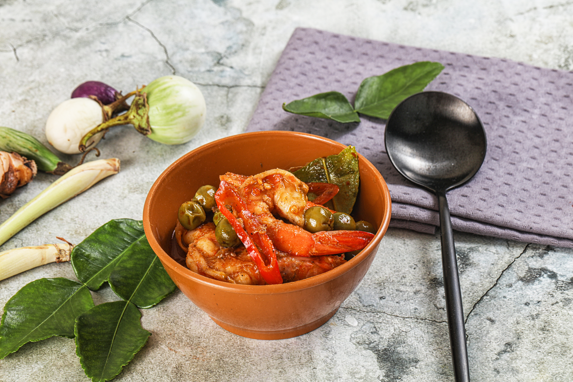 Overhead flat-lay of all ingredients for Silken Taiwanese Three Cup Chicken with Thai Basil laid out on a kitchen surface.