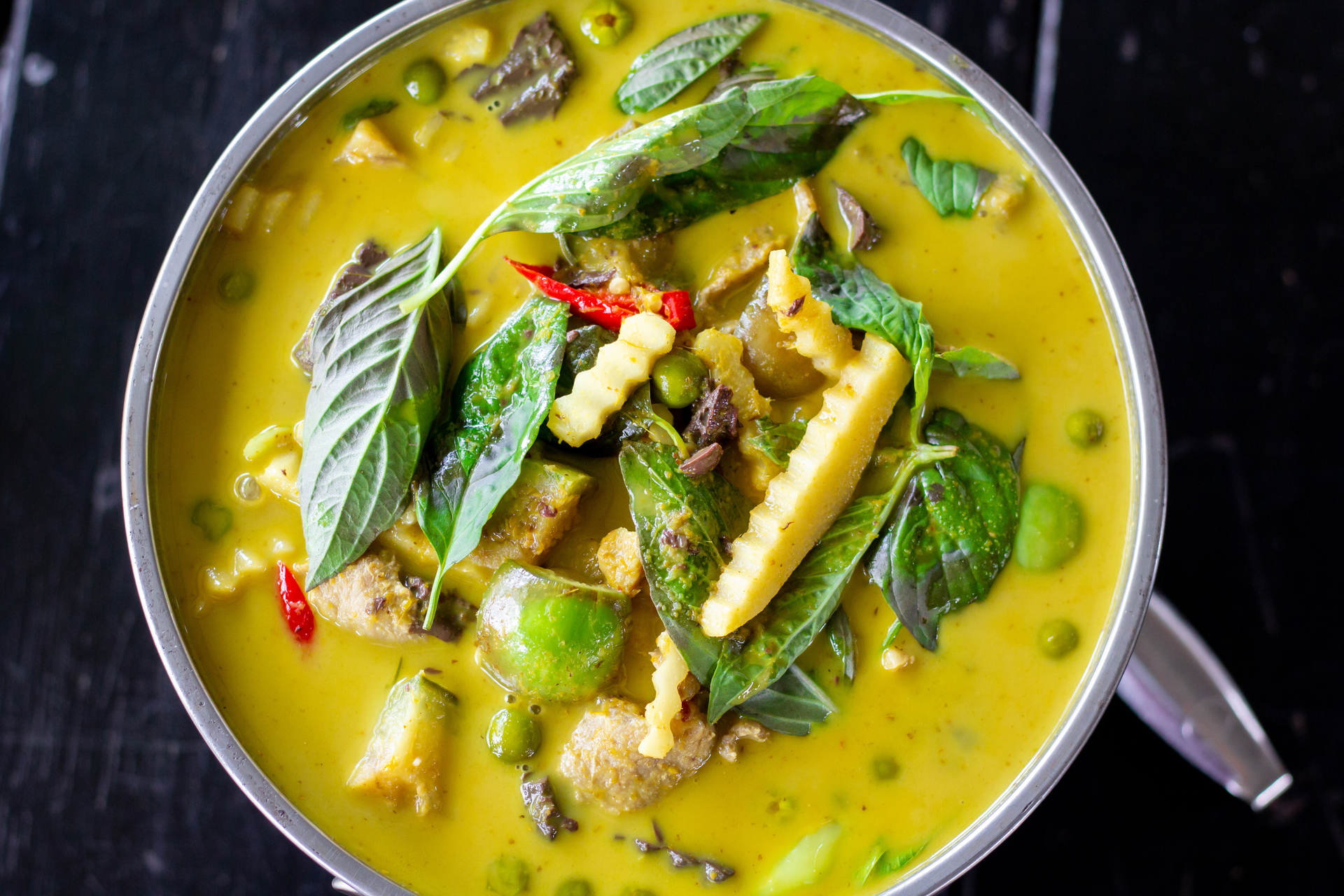 Silken Thai Lemongrass Fish Curry with Pineapple — Main Course served and photographed from above