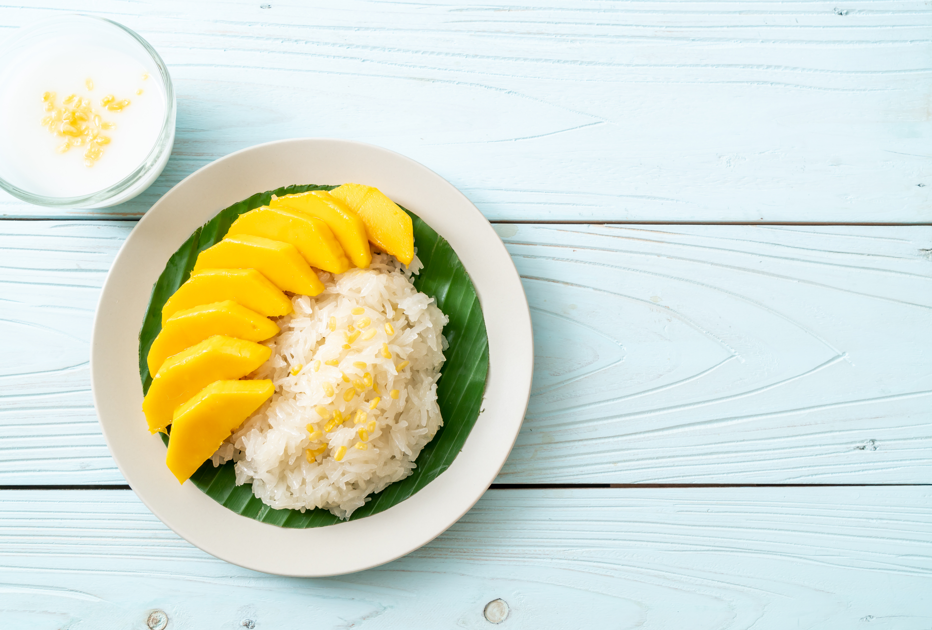 Silken Thai Mango Sticky Rice with Coconut Cream — Dessert served and photographed from above