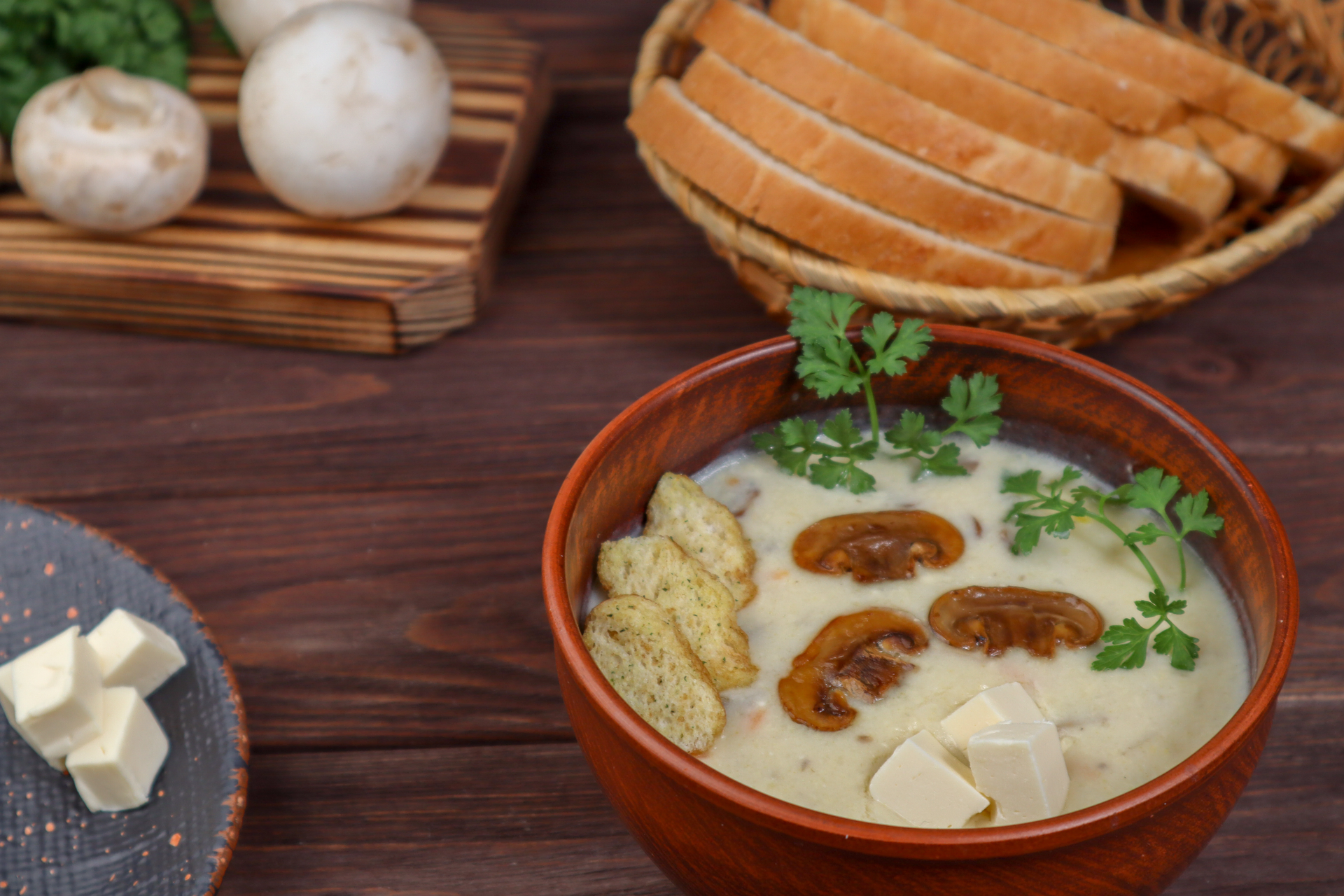 Overhead flat-lay of all ingredients for Silky Chinese Egg Drop Soup with Scallions and Tofu laid out on a kitchen surface.