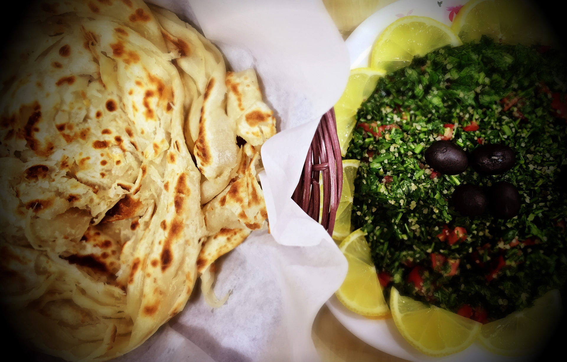 Overhead flat-lay of all ingredients for Silky Ethiopian Chiro with Berbere Spices and Flatbread laid out on a kitchen surface.