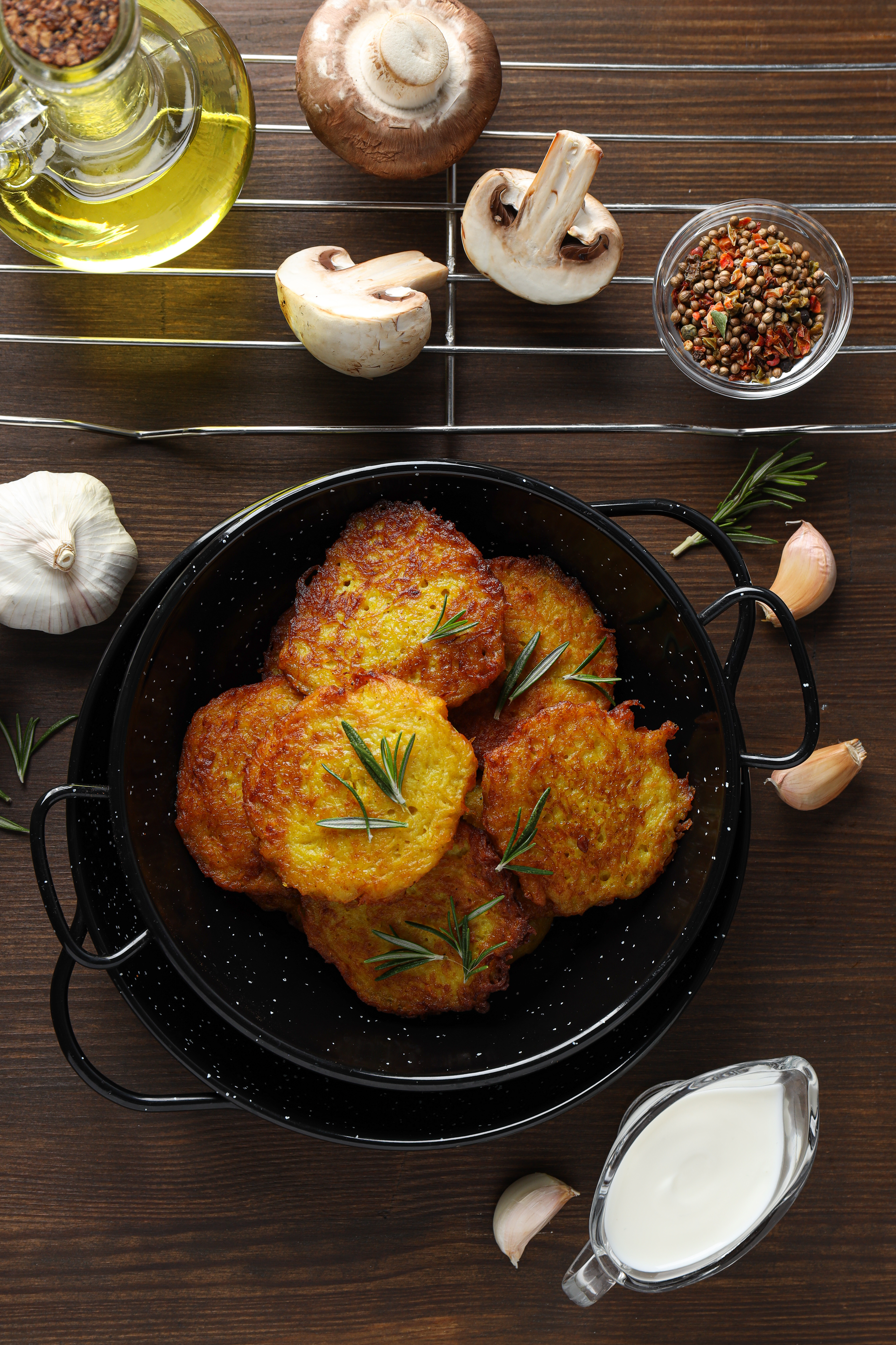 Overhead flat-lay of all ingredients for Sizzling Corsican Brocciu Fritter with Herb Garnish laid out on a kitchen surface.