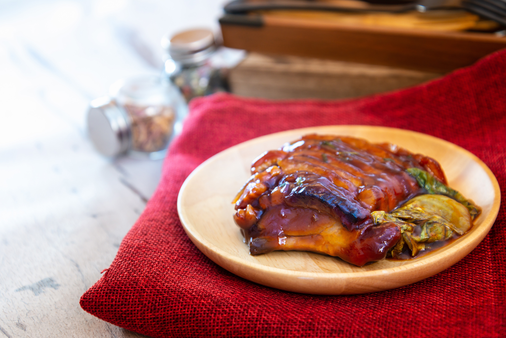 Overhead flat-lay of all ingredients for Slow-Cooked Cantonese Char Siu Pork with Sticky Glaze laid out on a kitchen surface.