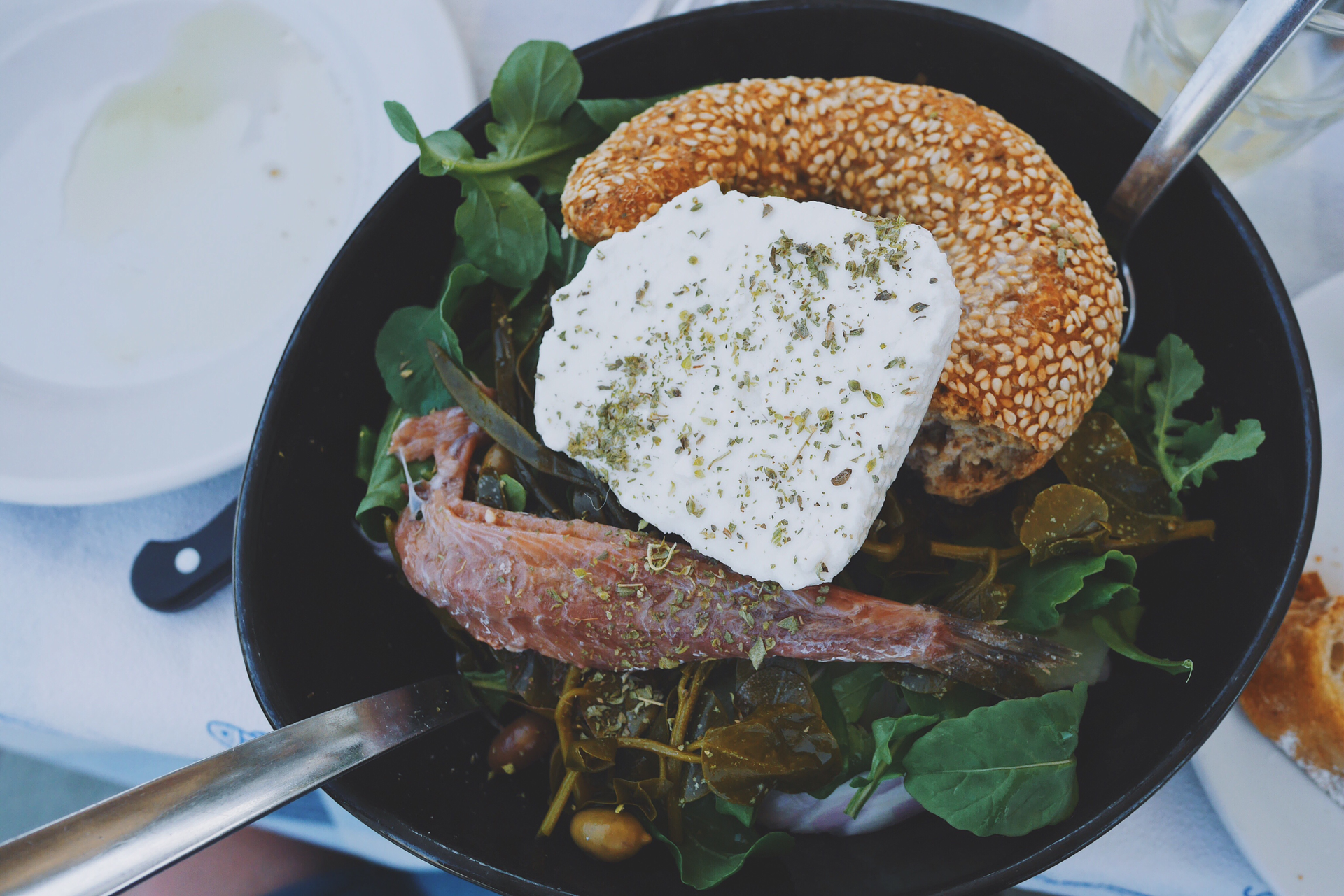 Overhead flat-lay of all ingredients for Smoked Icelandic Char with Dill Sauce laid out on a kitchen surface.