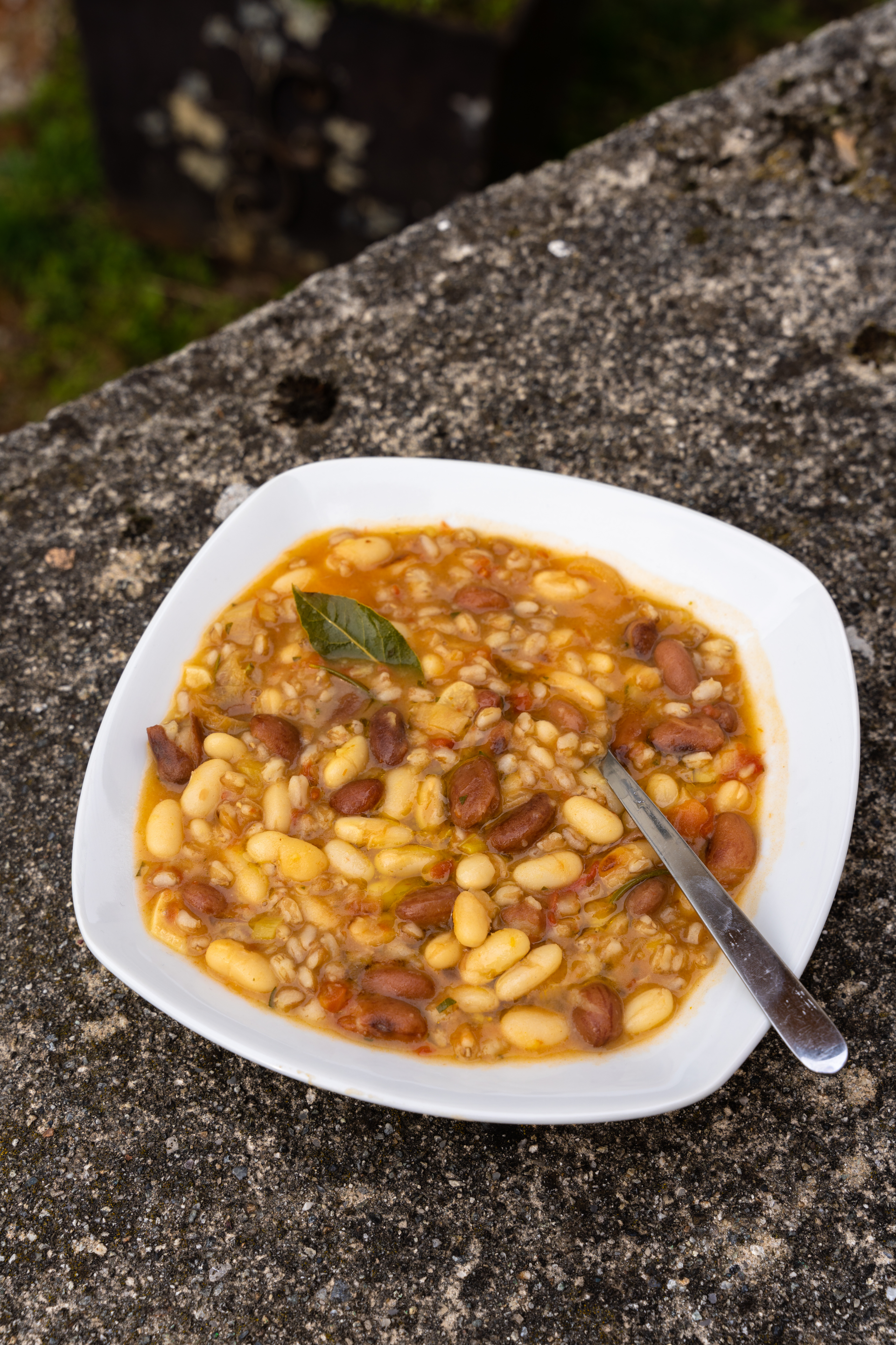 Smoky Bolivian Sopa de Mani with Peanut Garnish — Soup served and photographed from above