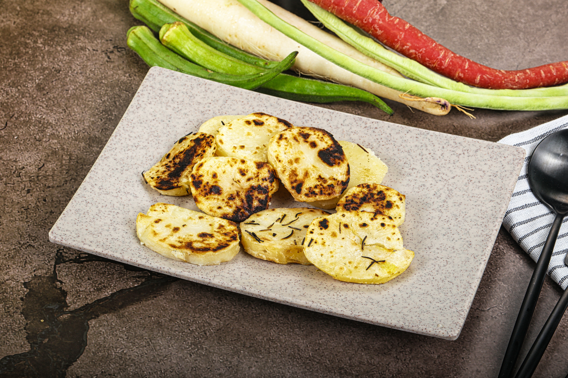 Overhead flat-lay of all ingredients for Smoky Brazilian Cassava Cheese Bread with Spicy Chimichurri laid out on a kitchen surface.