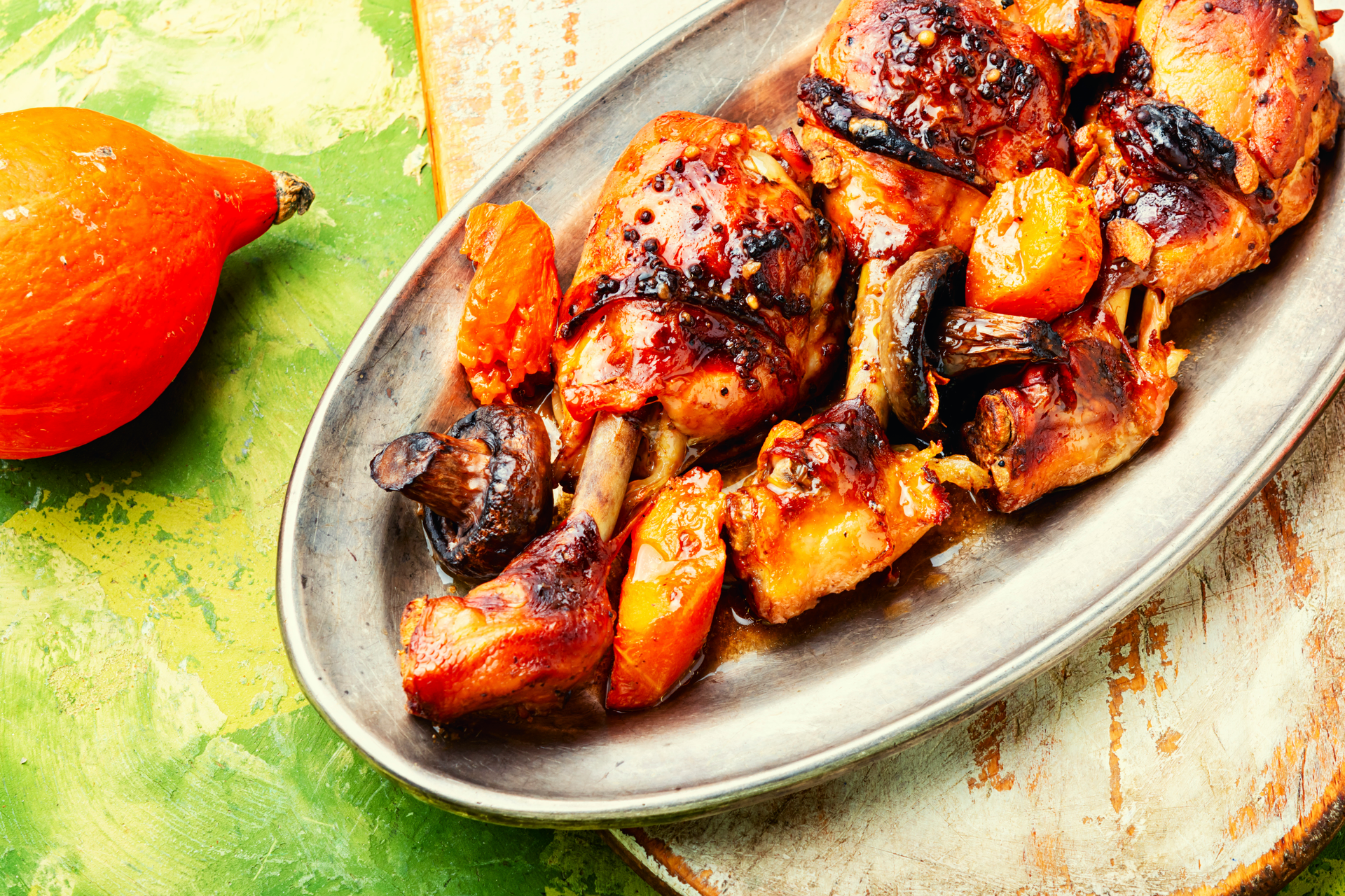 Overhead flat-lay of all ingredients for Smoky Caribbean Coconut and Lime Grilled Chicken laid out on a kitchen surface.