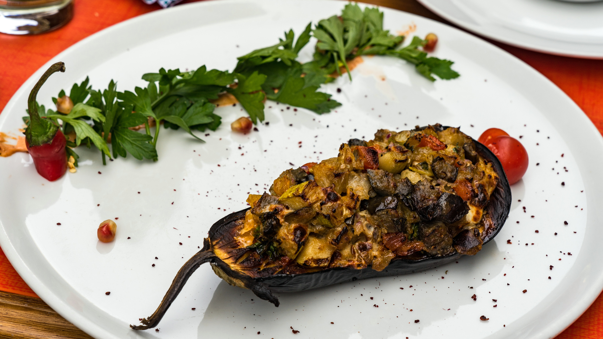Smoky Moroccan Eggplant Zaalouk with Harissa Drizzle — Appetizer served and photographed from above