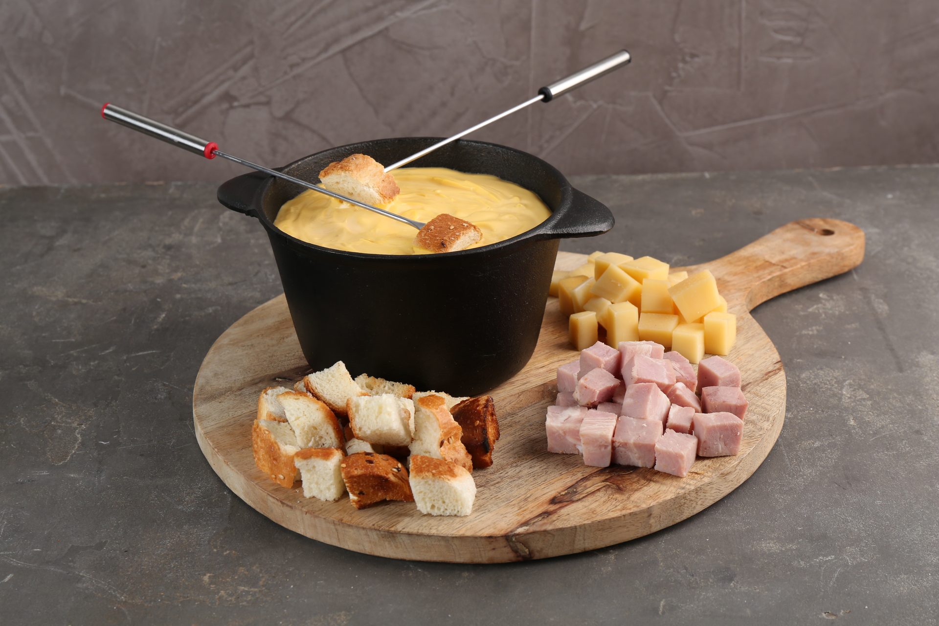 Overhead flat-lay of all ingredients for Smoky Spanish Serrano Ham Croquettes with Manchego Fondue laid out on a kitchen surface.