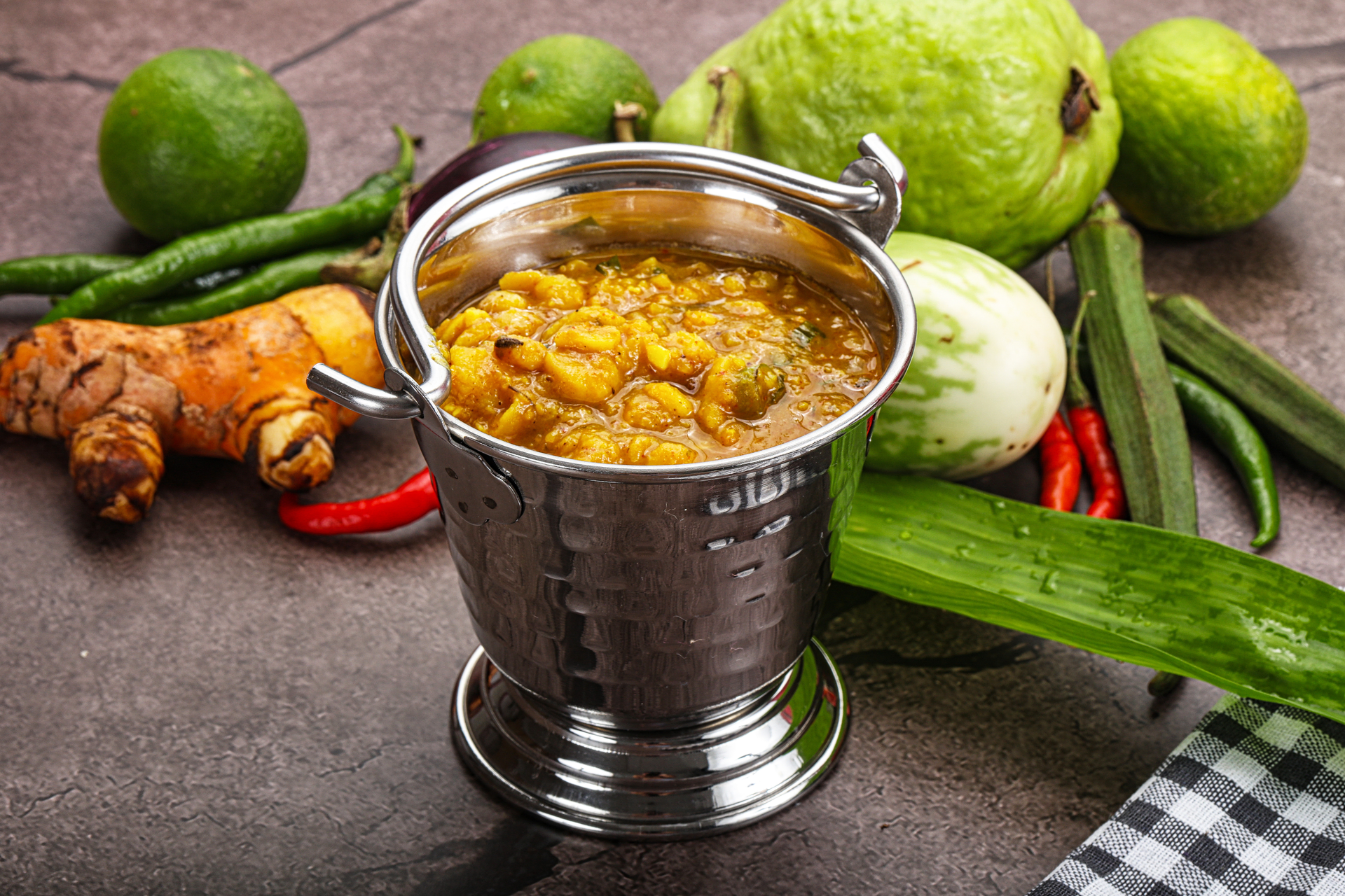 South Indian Drumstick Sambar with Spiced Tamarind Broth — Main Course served and photographed from above