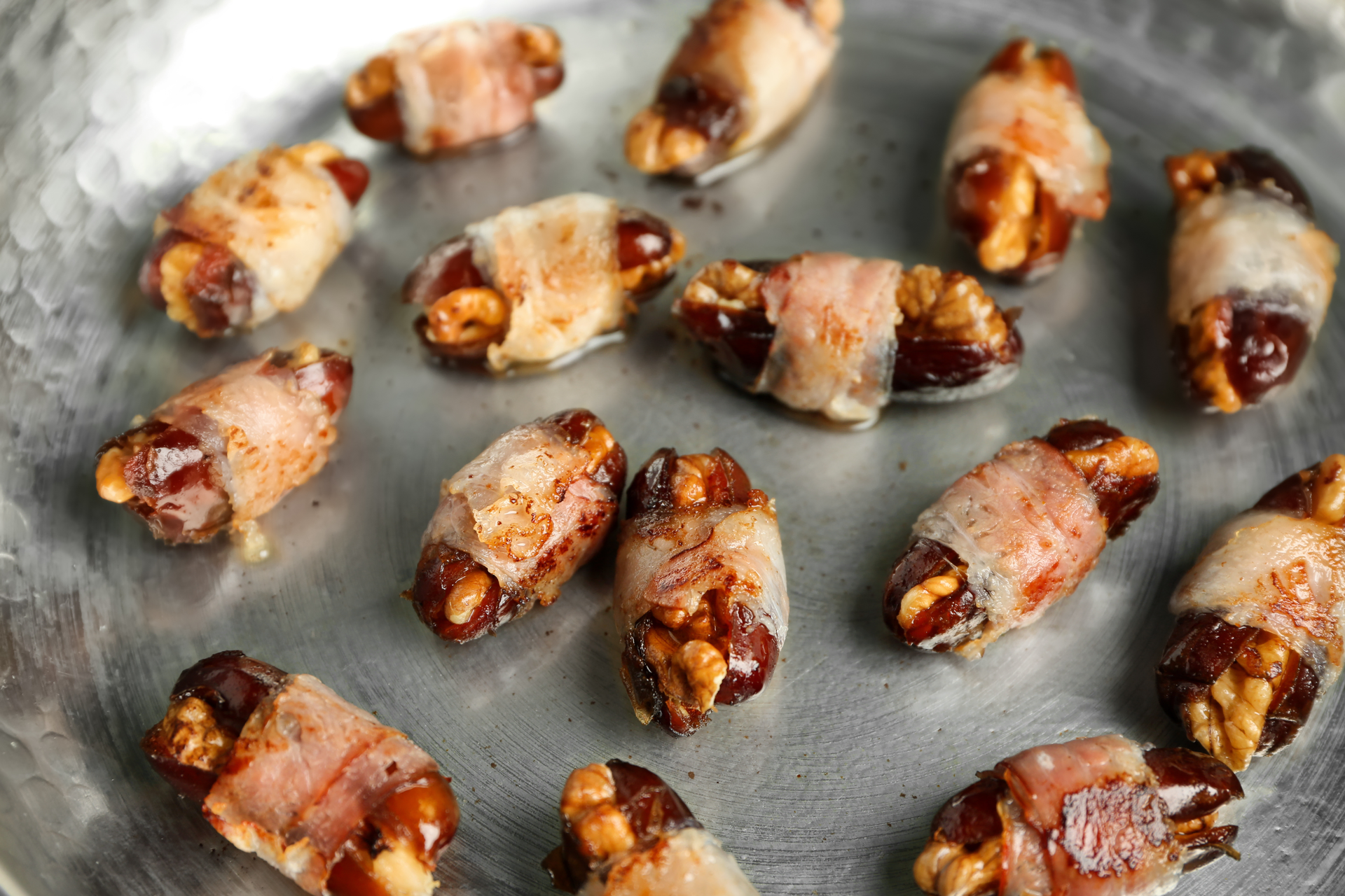 Overhead flat-lay of all ingredients for Spanish Manchego and Cured Meat Bites with Honey Drizzle laid out on a kitchen surface.