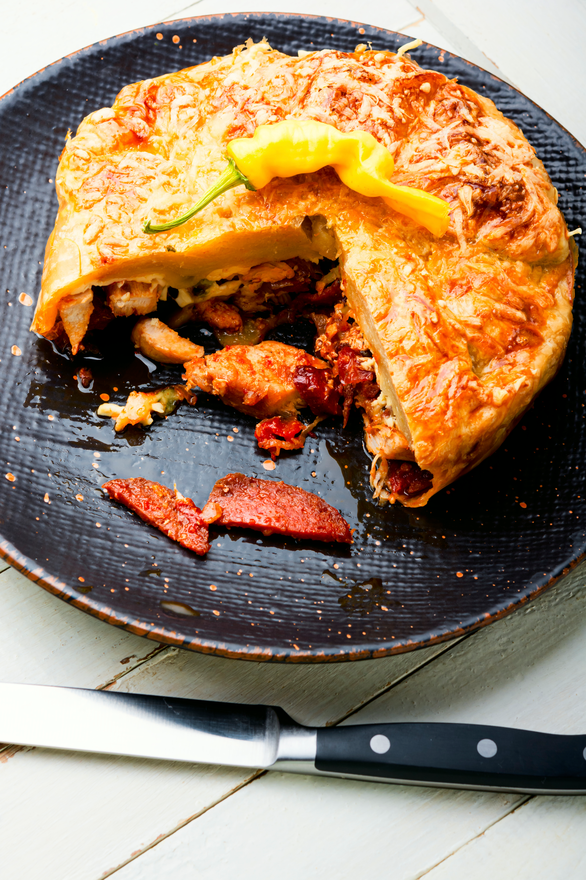 Spiced Acadian Rappie Pie with Savory Ham — Main Course served and photographed from above
