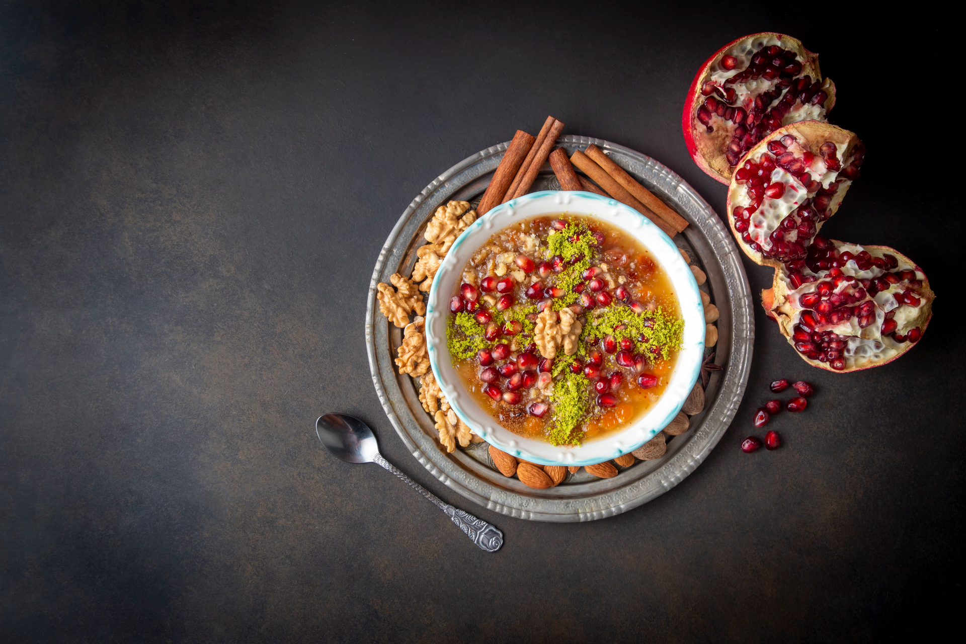 Overhead flat-lay of all ingredients for Spiced Afghan Koufta Asa with Pomegranate Molasses Glaze laid out on a kitchen surface.
