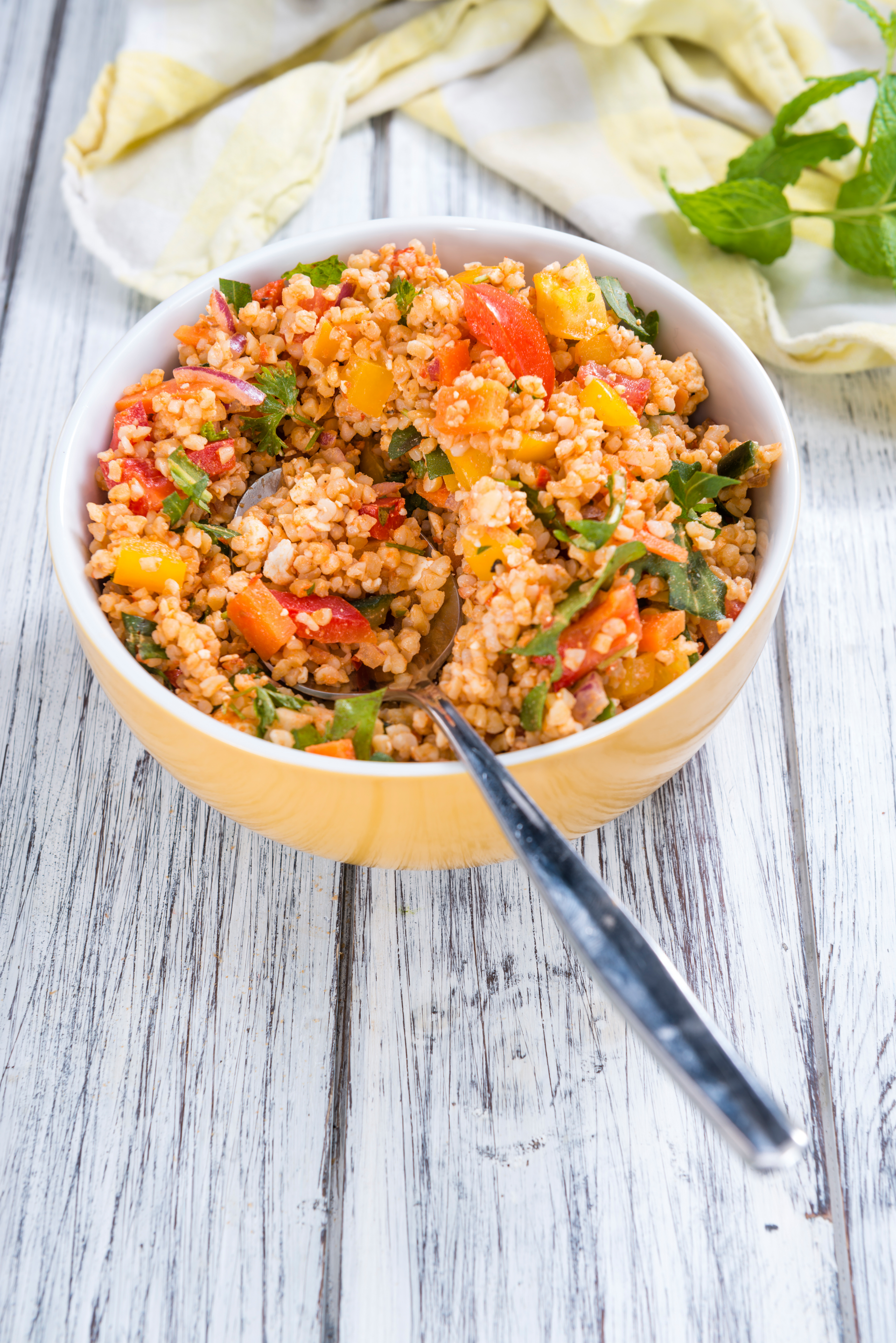 Overhead flat-lay of all ingredients for Spiced Cuban Sofrito Rice with Fresh Cilantro laid out on a kitchen surface.