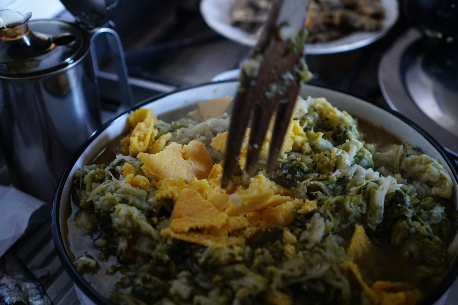 Overhead flat-lay of all ingredients for Spiced Guatemalan Hilachas with Cilantro Rice laid out on a kitchen surface.