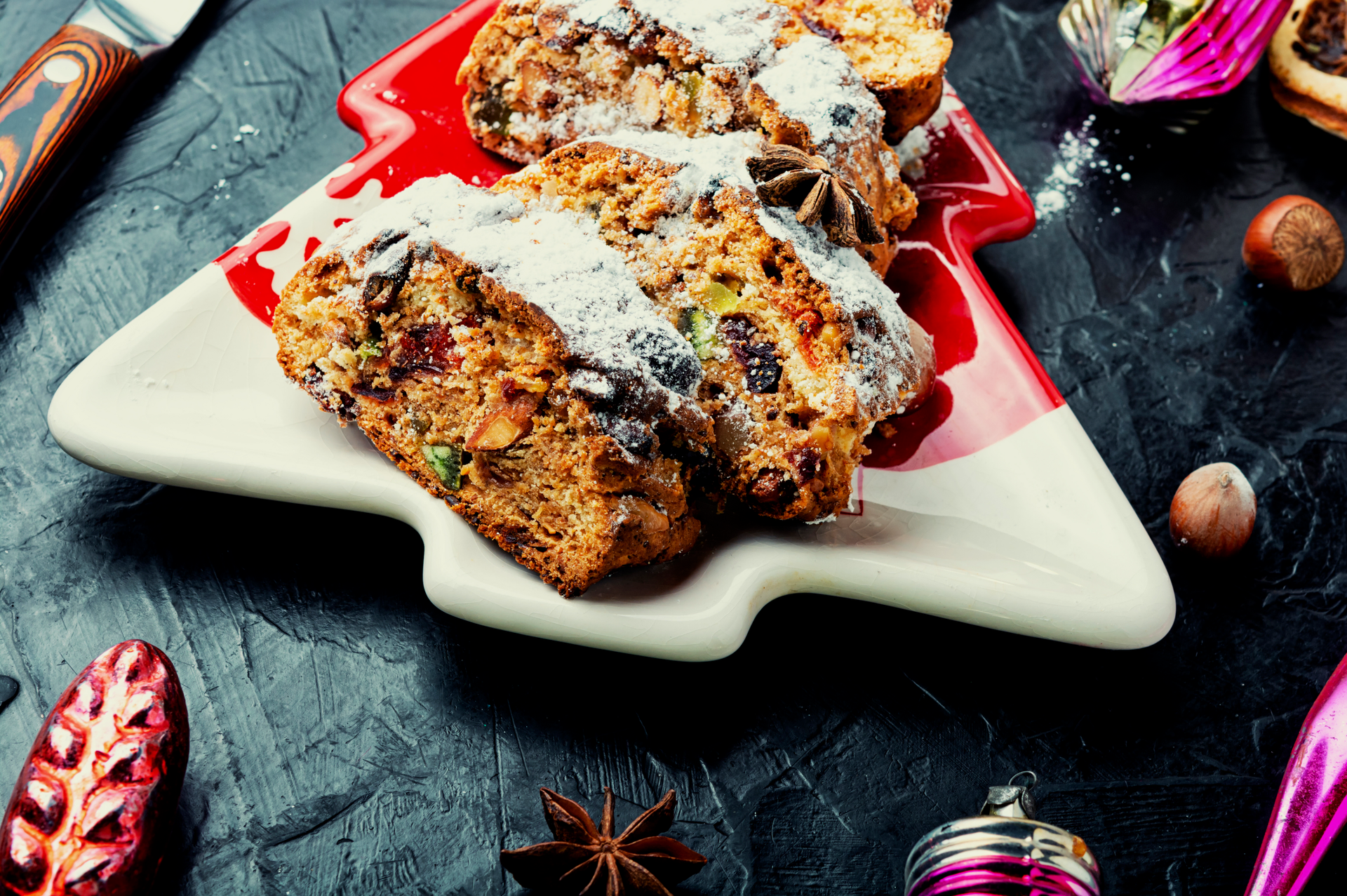 Overhead flat-lay of all ingredients for Spiced Italian Panforte with Candied Fruit and Nuts laid out on a kitchen surface.