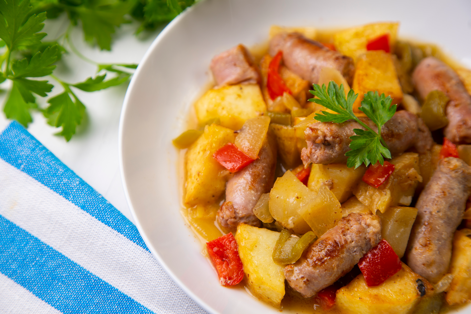 Spicy Bolivian Pique a lo Macho with Sausages and Peppers — Main Course served and photographed from above