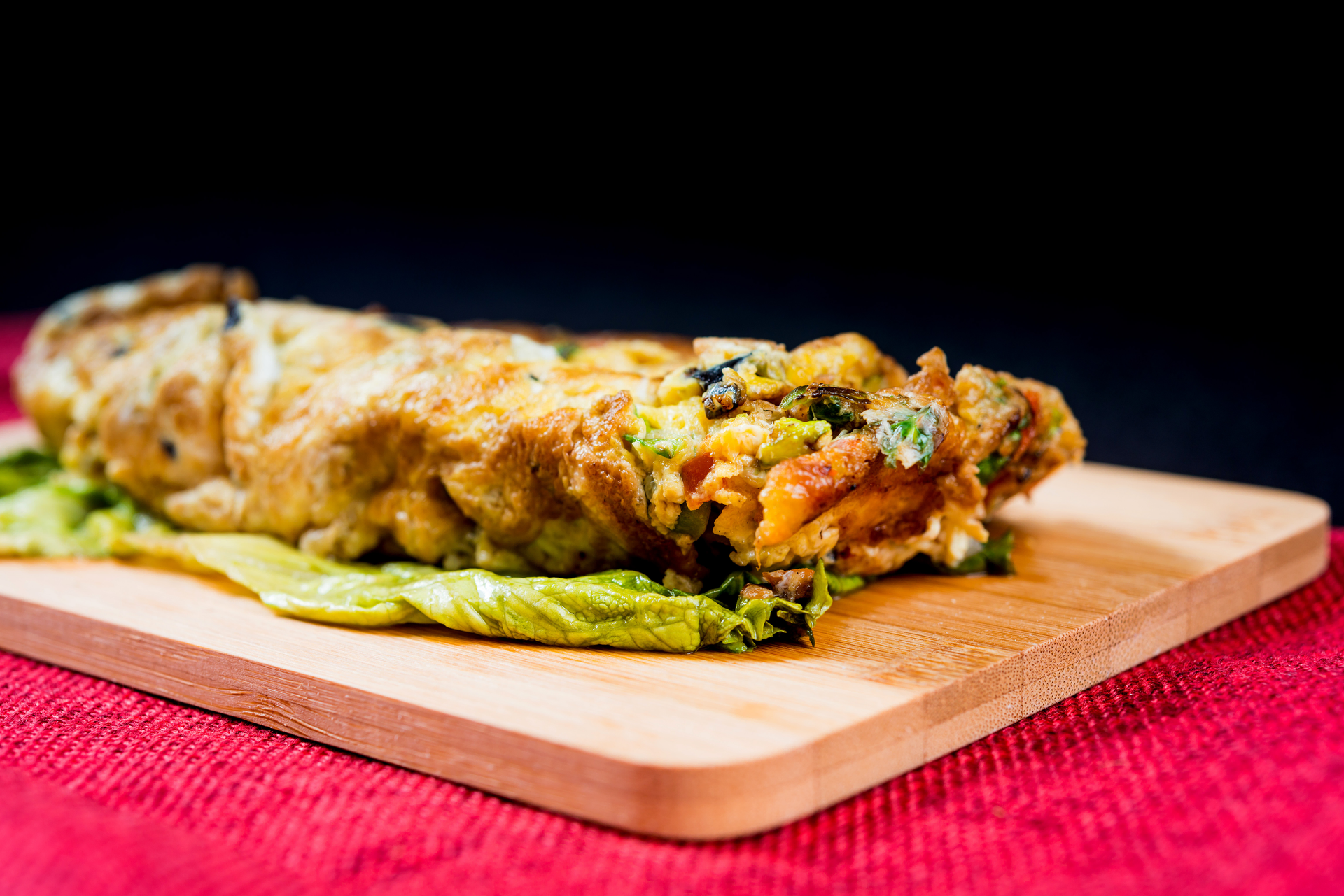 Overhead flat-lay of all ingredients for Spicy Brazilian Acarajé Tacos with Vatapá and Green Sauce laid out on a kitchen surface.