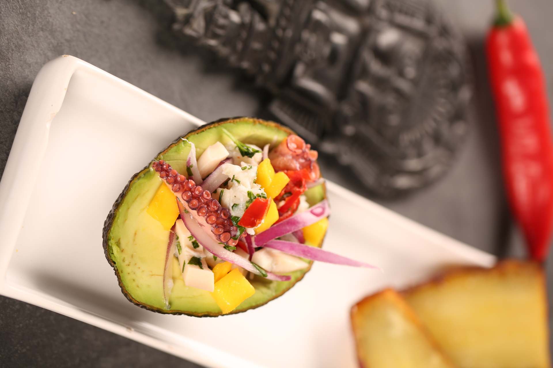 Spicy Ecuadorian Ceviche de Chocho with Avocado and Lime — Appetizer served and photographed from above